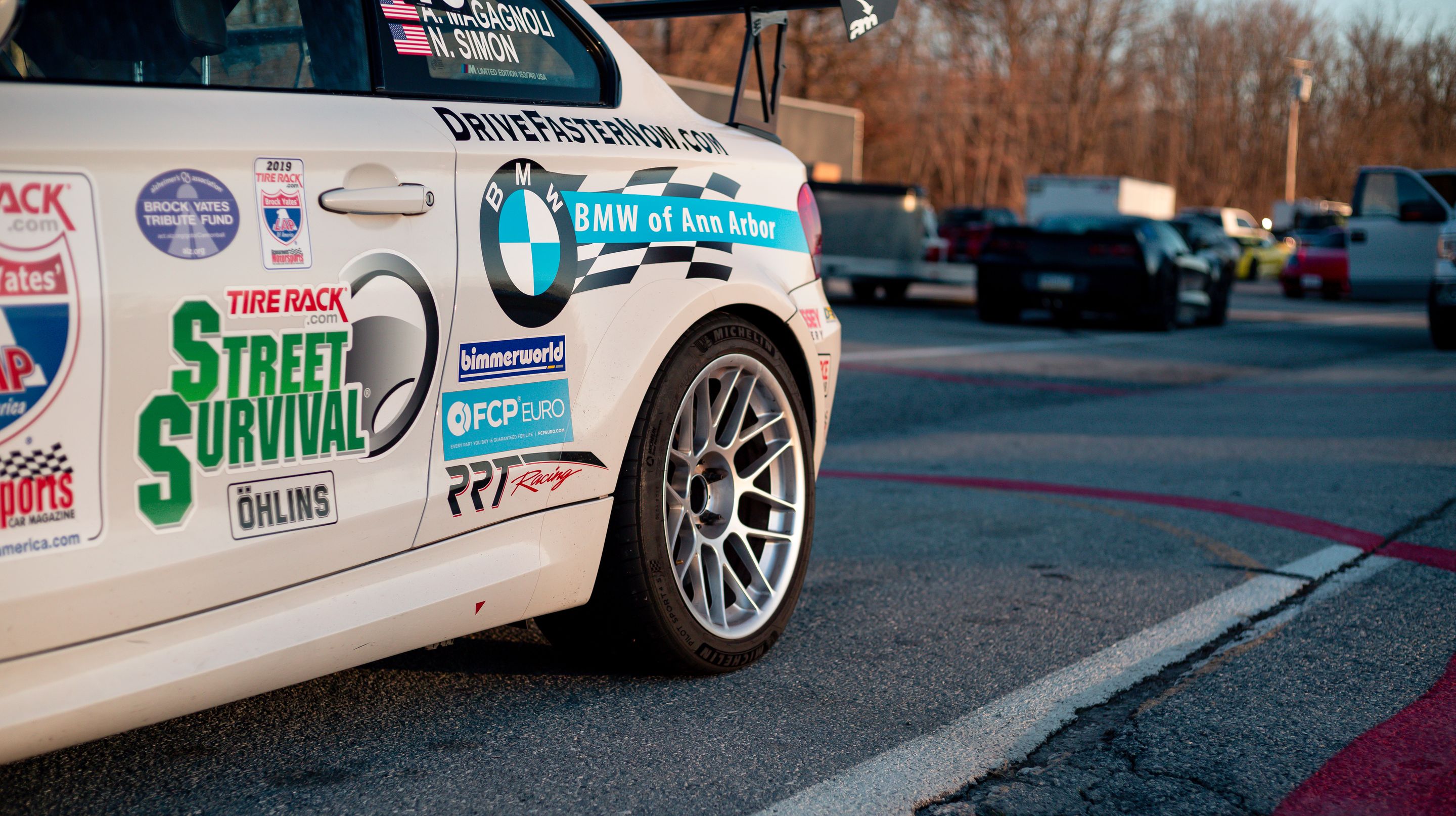 White BMW E82 1M with 18" ARC-8 Apex wheels in Hyper Silver