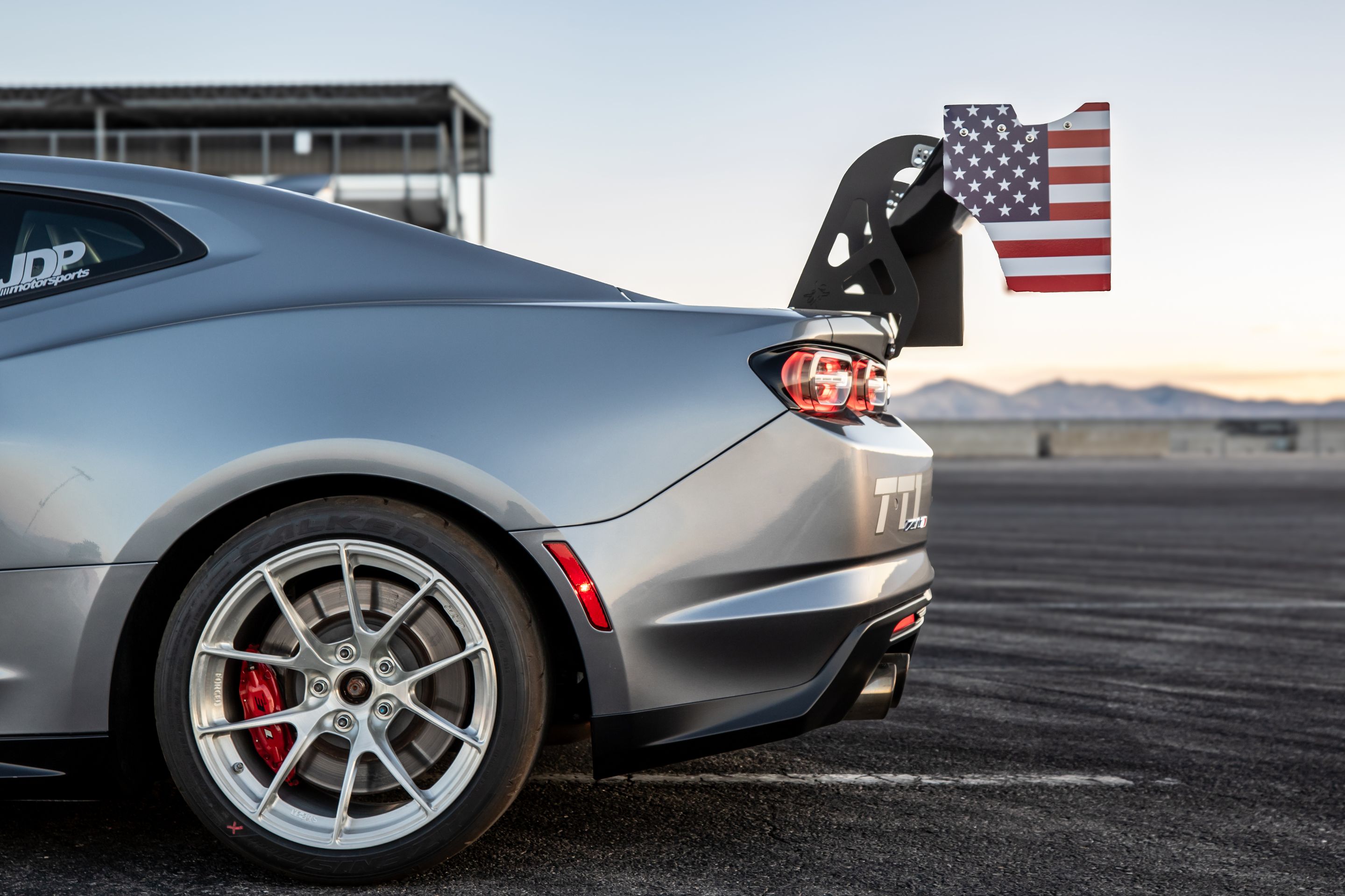 Grey Chevrolet 6th Gen Camaro ZL1 1LE with 18" VS-5RS Apex wheels in Brushed Clear