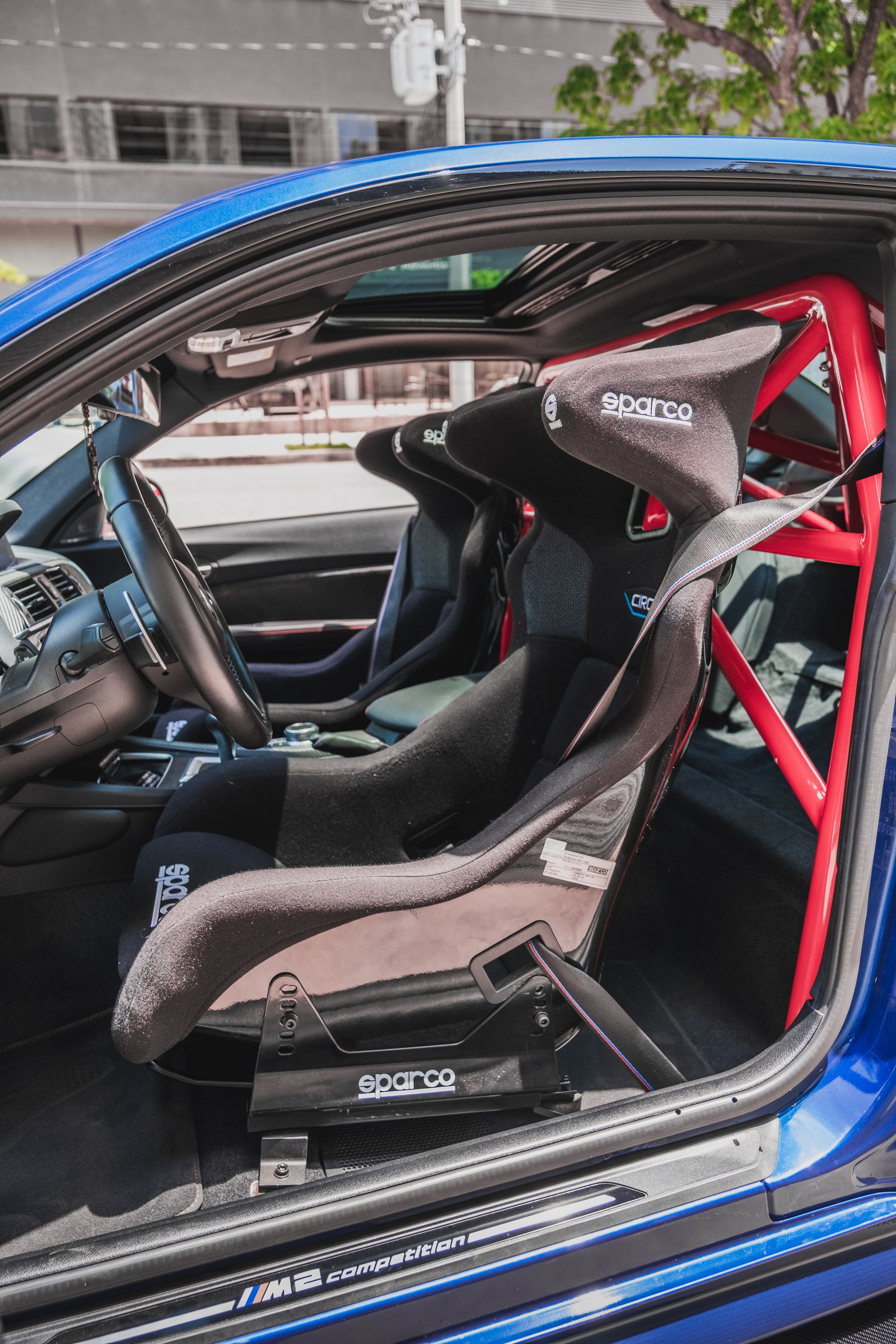 Blue BMW F87 M2 with 19" SM-10 Apex wheels in Race Silver