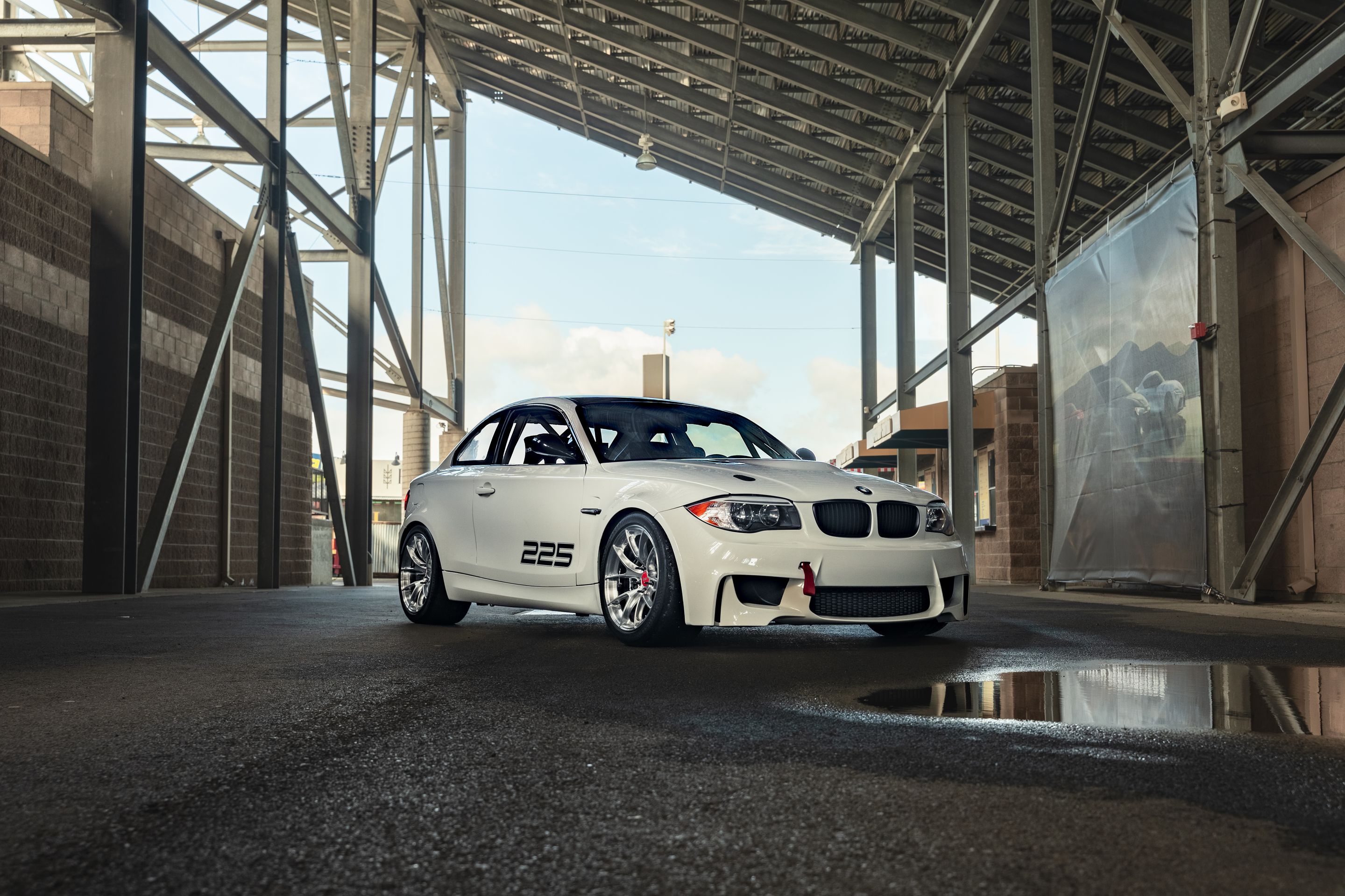 White BMW E82 1M with 18" VS-5RS Apex wheels in Brushed Clear