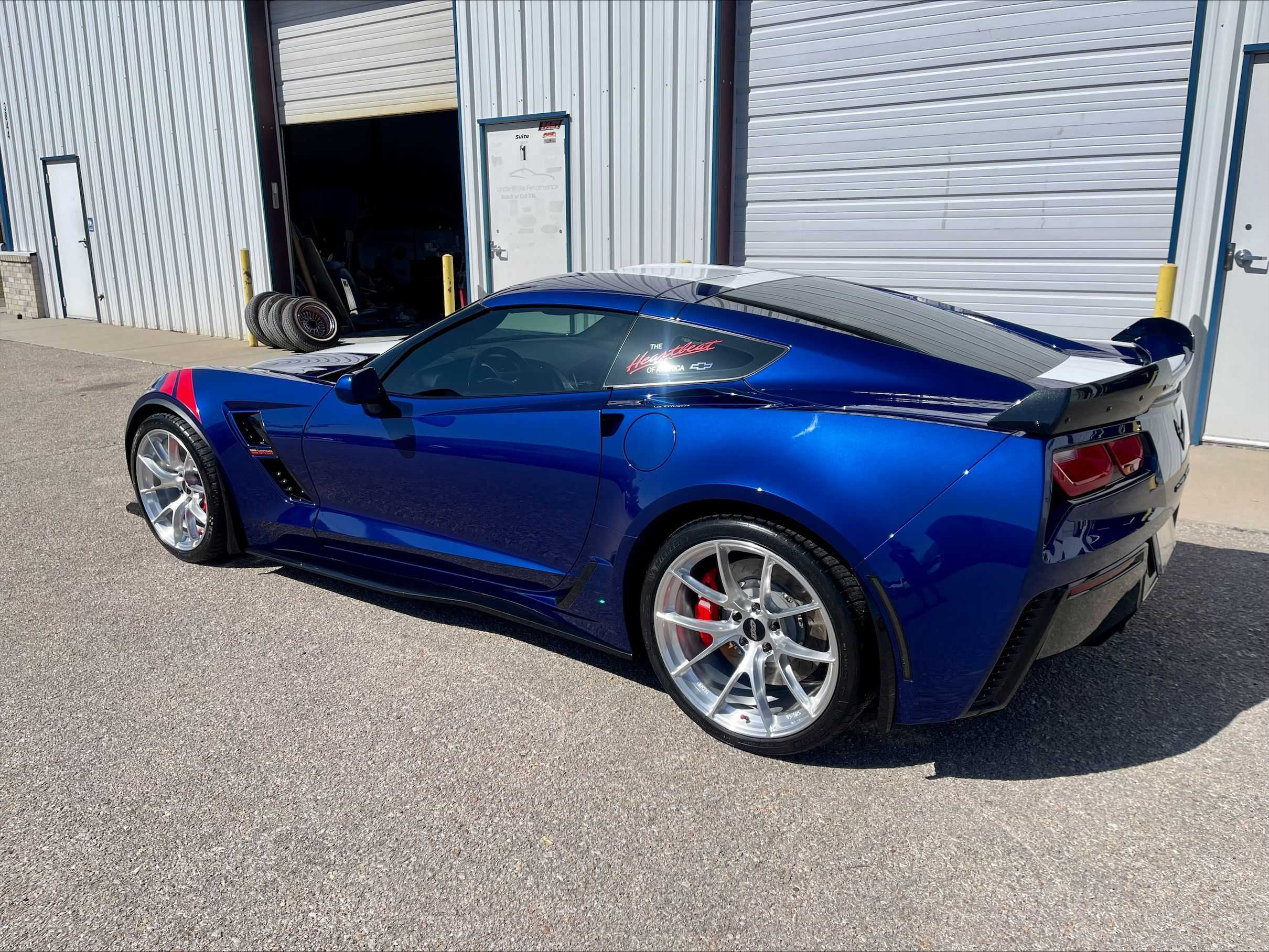 Blue Chevrolet C7 Corvette Grand Sport with 19"/20" VS-5RS Apex wheels in Brushed Clear