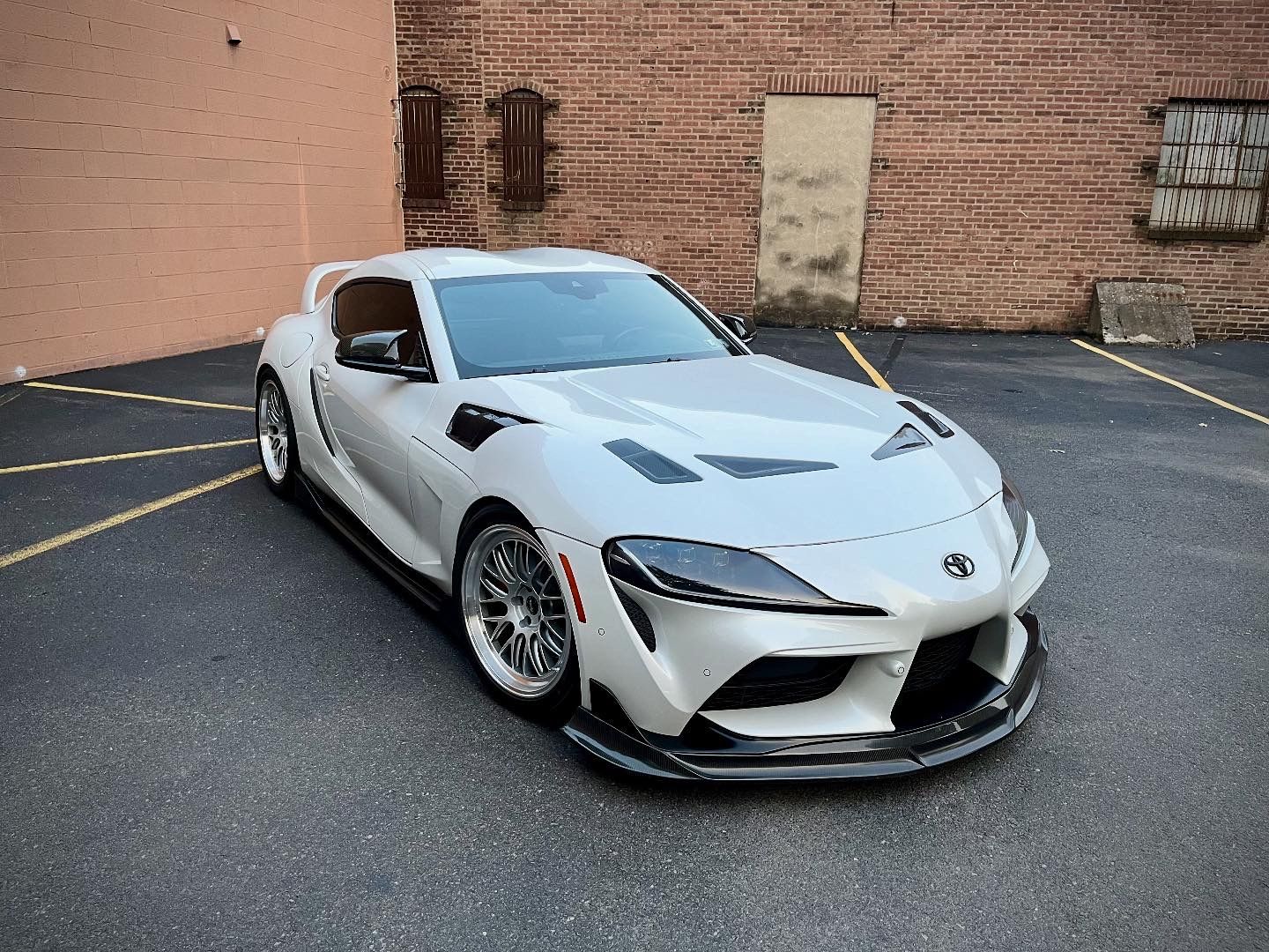 White Toyota GR Supra with 19" ML-10RT Apex wheels in Machined Lip Race Silver
