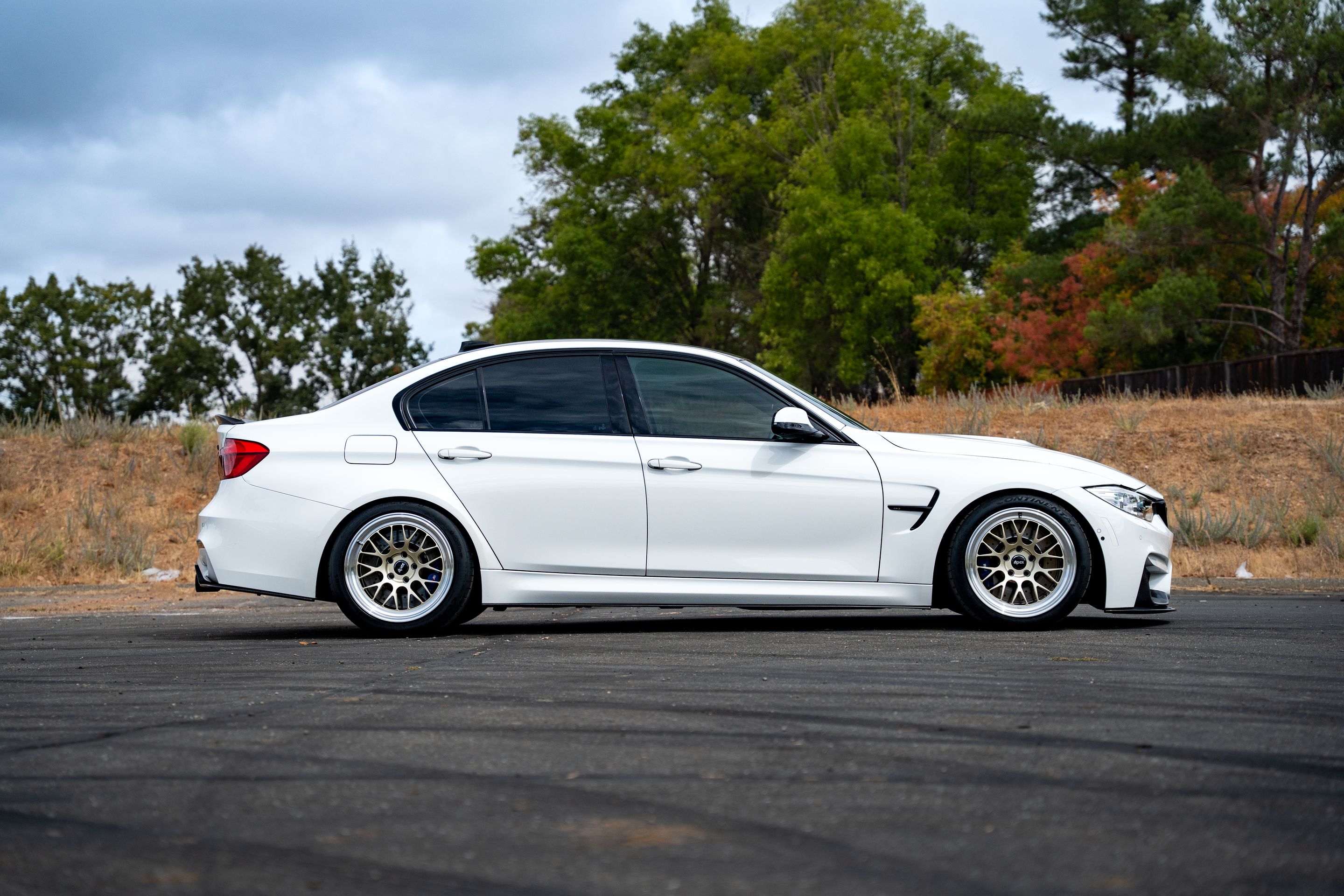 White BMW F80 M3 with 18" ML-10RT Apex wheels in Machined Lip Gloss Motorsport Gold