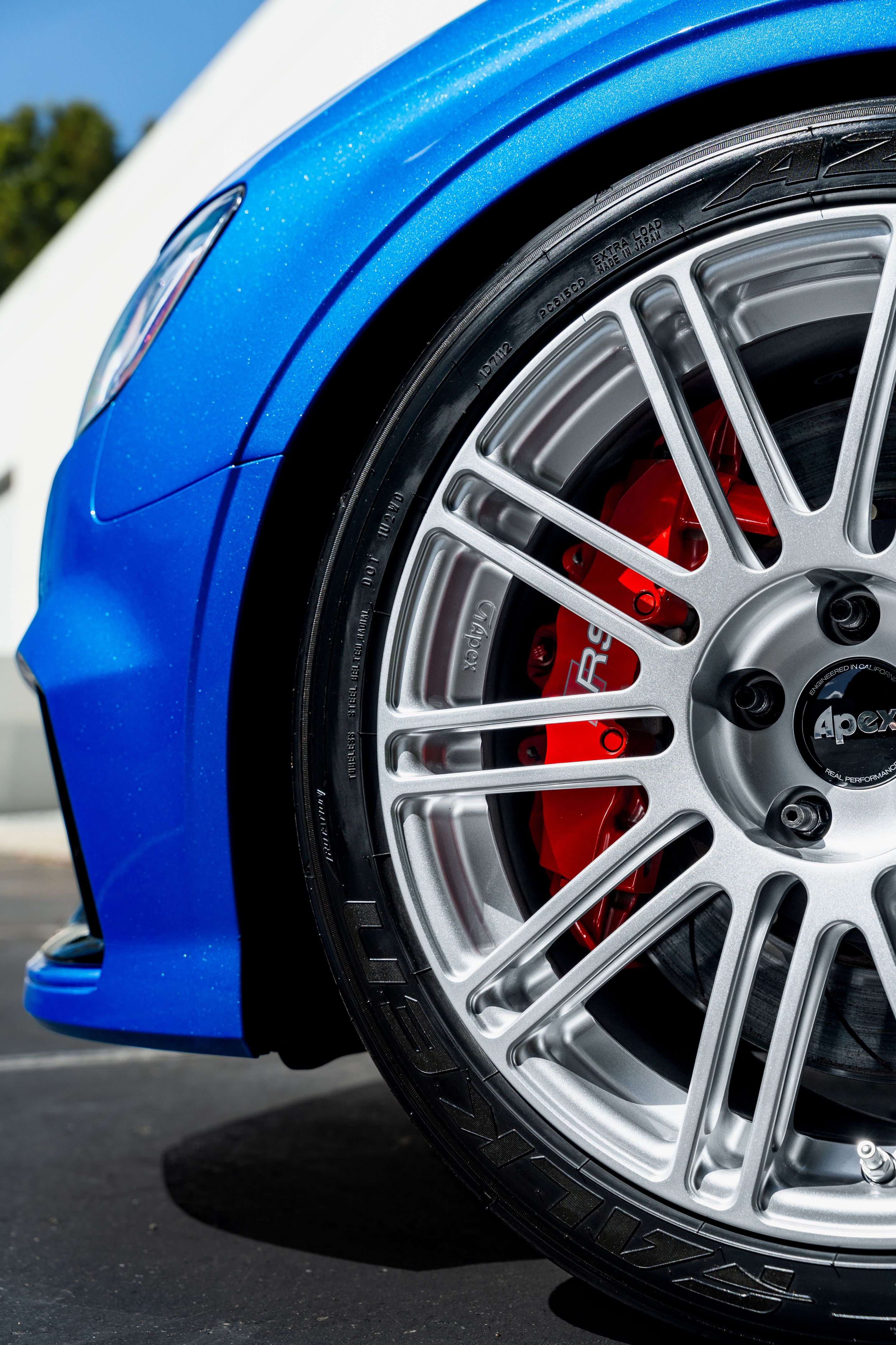 Blue Audi 8V RS 3 with 18" TC-10RT Apex wheels in Race Silver