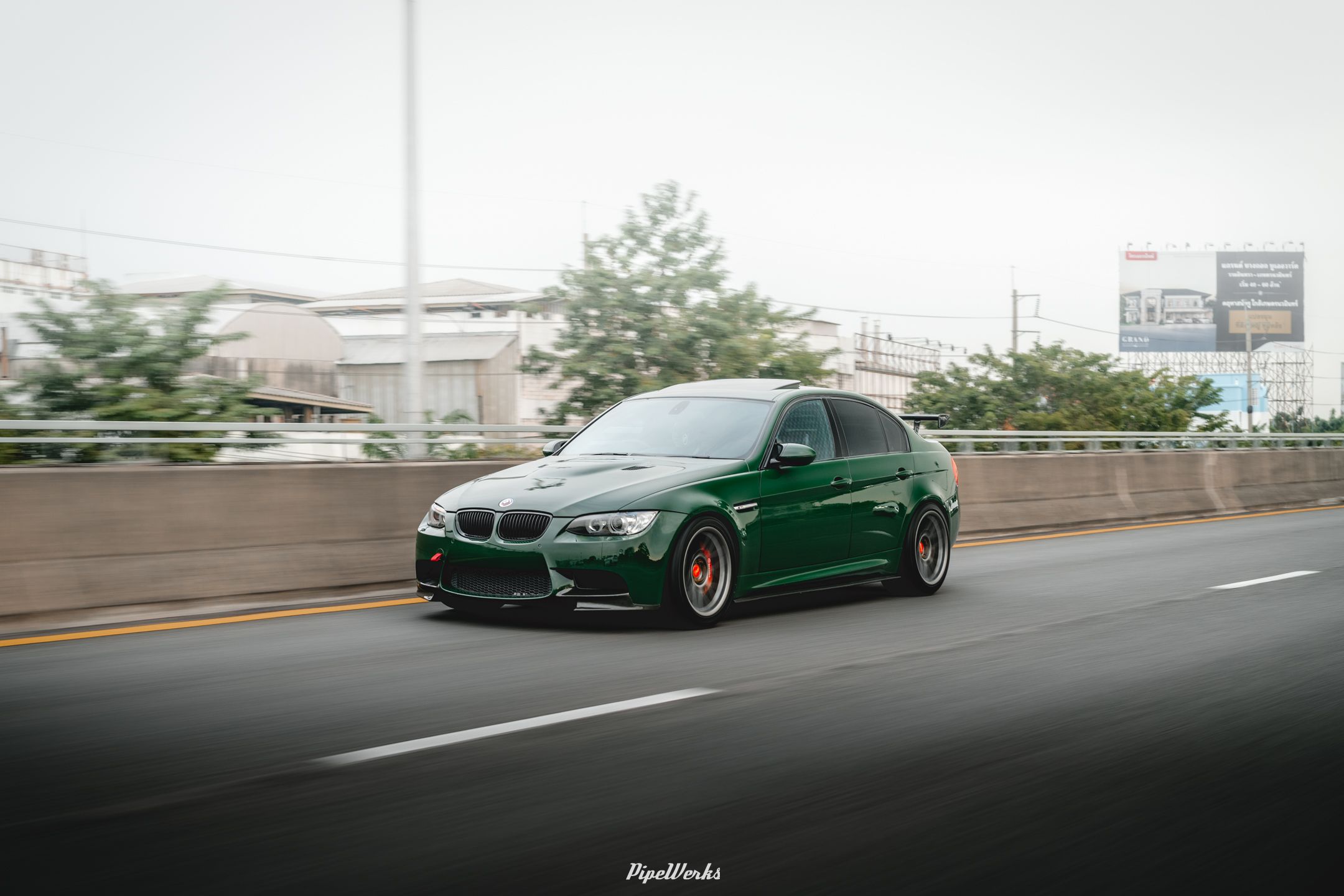 Green BMW E90 Sedan 3 Series with 18" ARC-8 Apex wheels in Anthracite