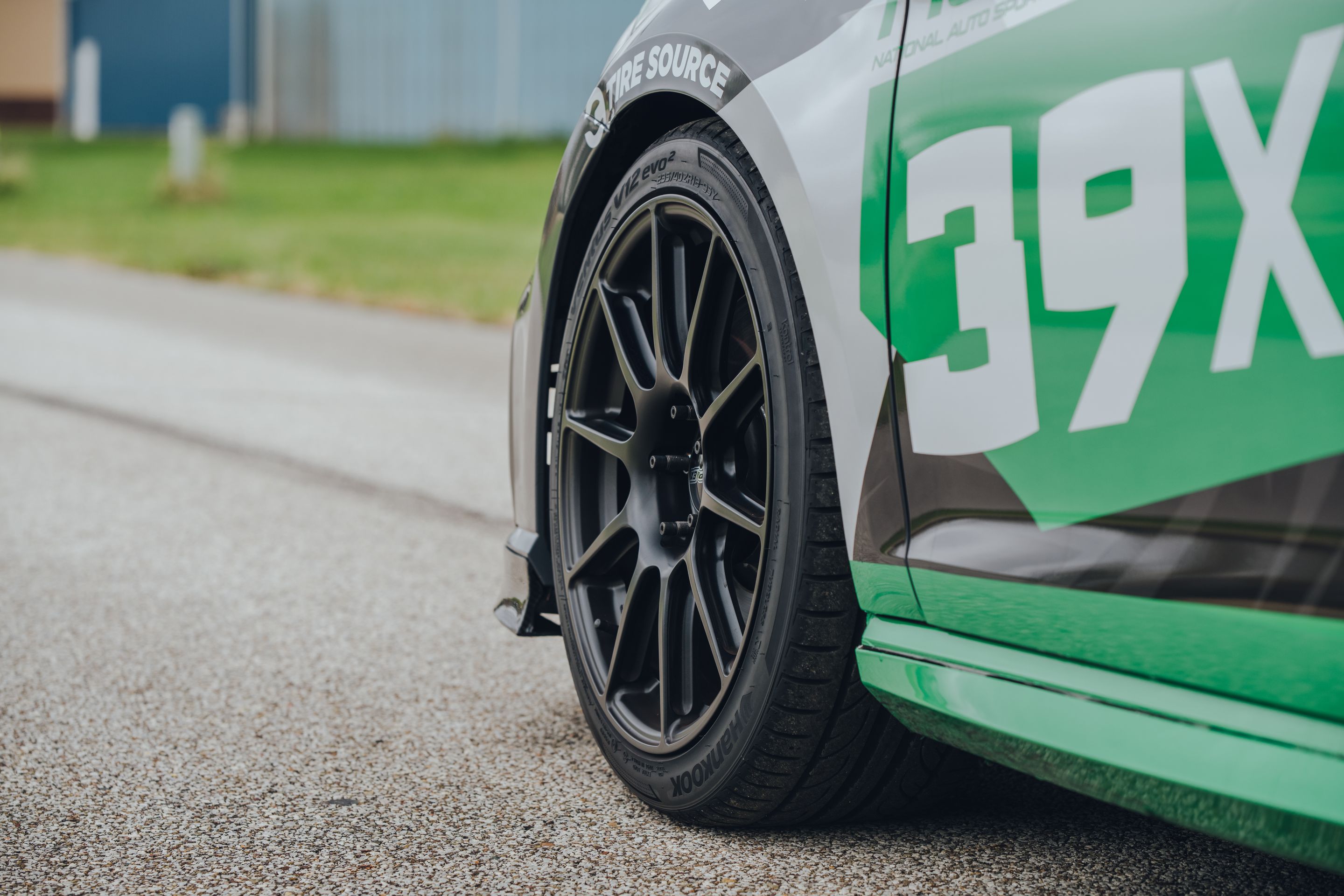 Race Livery VW MK7 GTI with 18" SM-10 Apex wheels in Satin Black