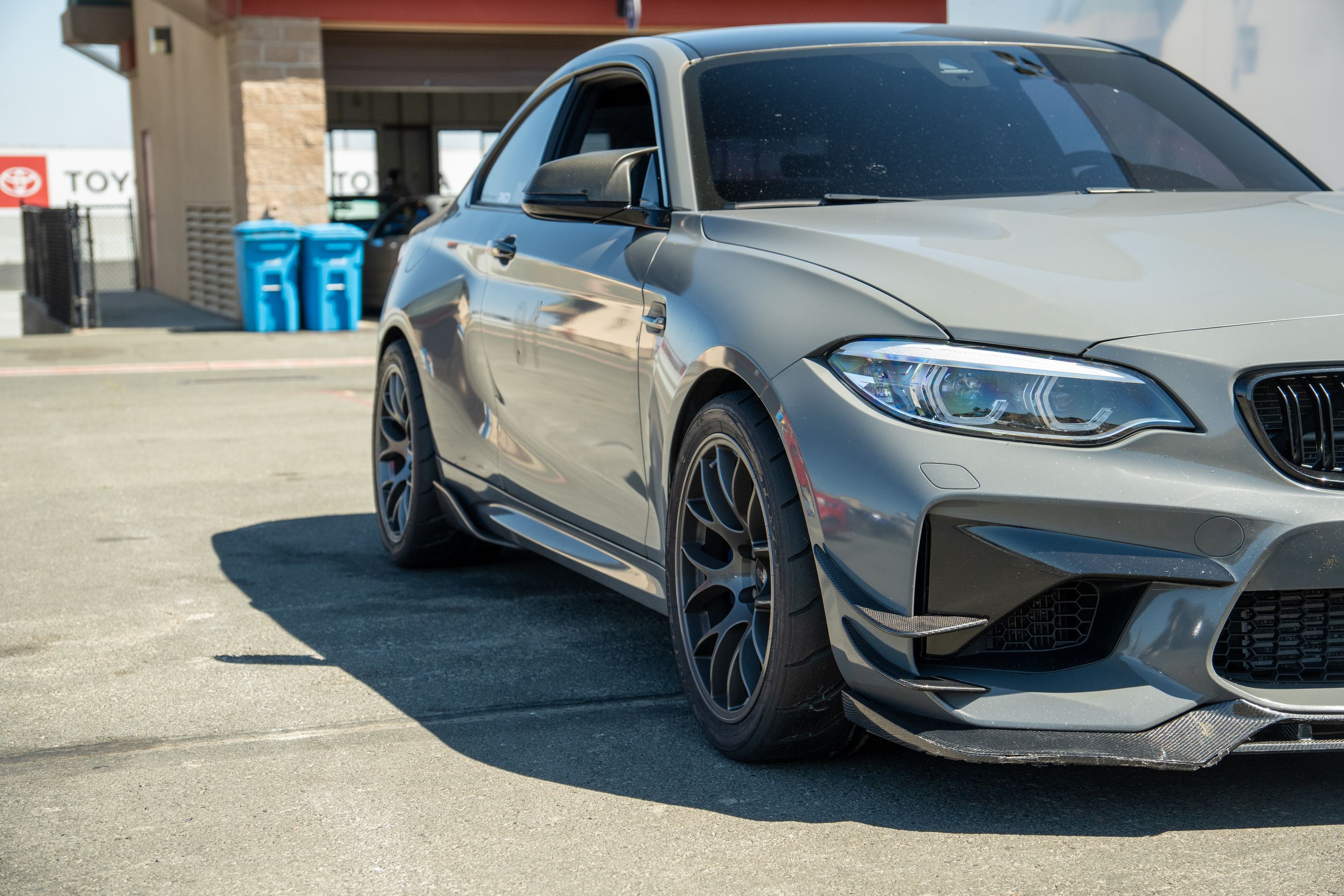 Grey BMW F87 M2 with 18" EC-7 Apex wheels in Anthracite