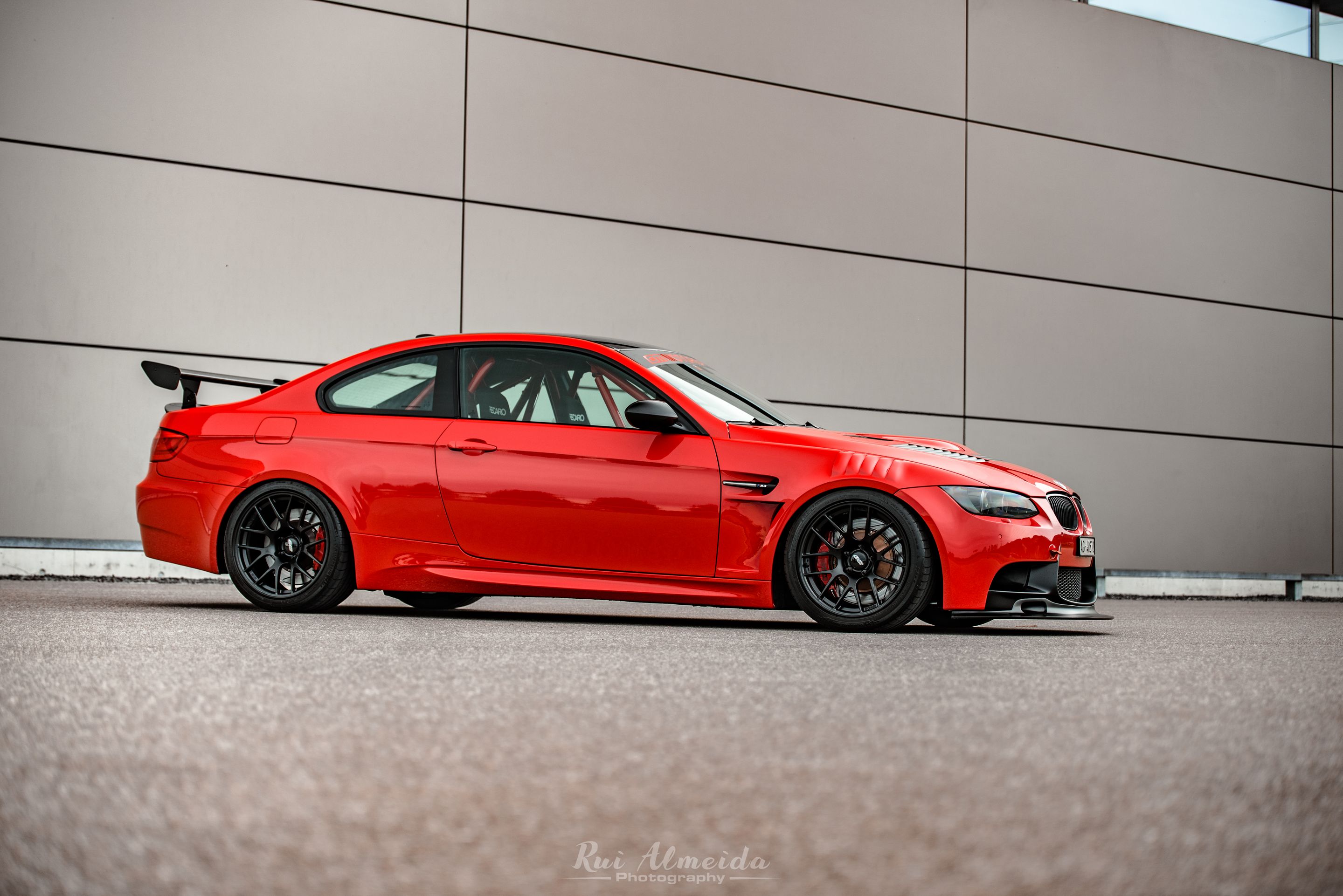 Red BMW E92 Coupe M3 with 18" EC-7R Apex wheels in Satin Black
