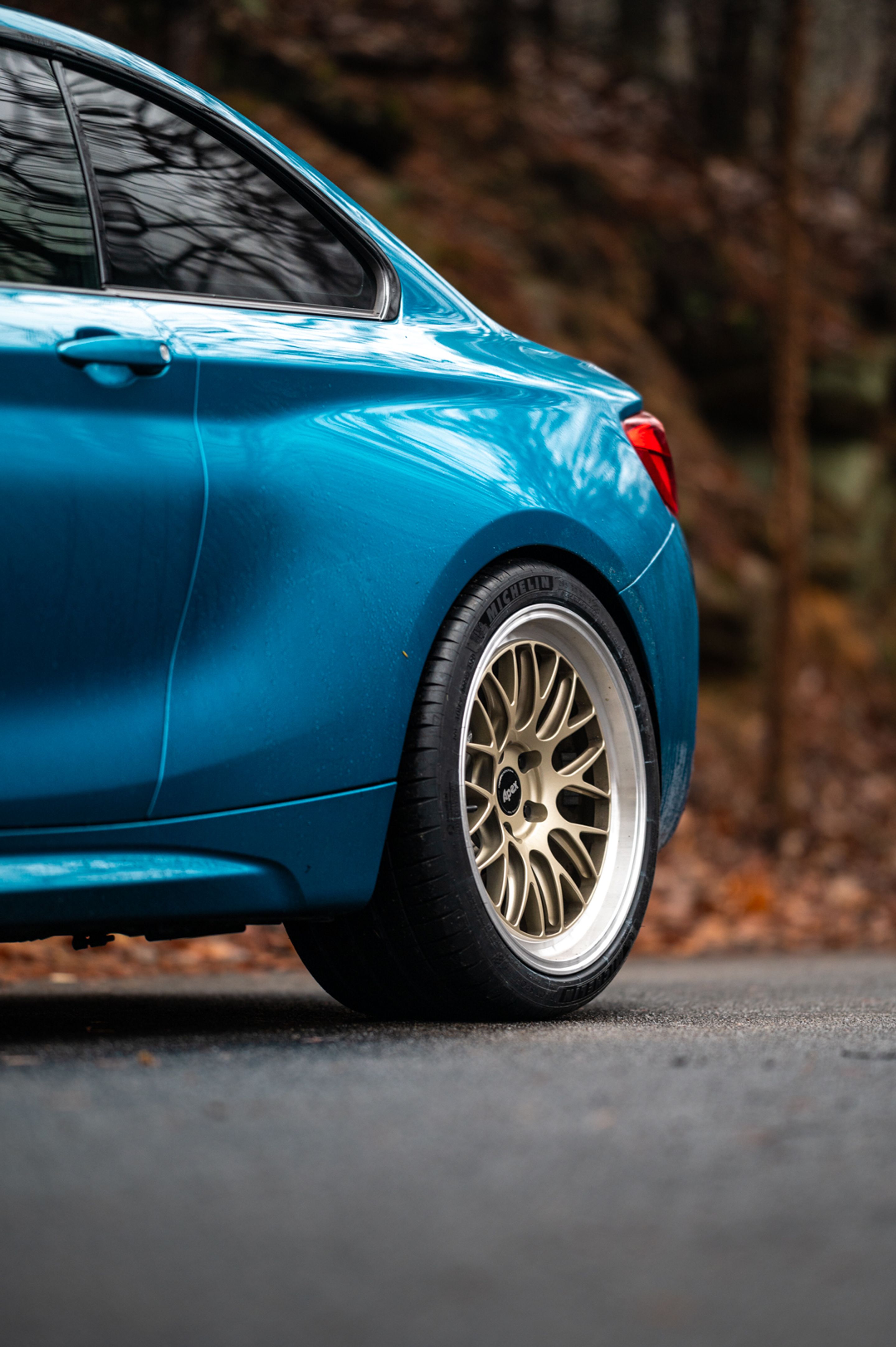 Blue BMW F87 M2 with 19" ML-10RT Apex wheels in Machined Lip Gloss Motorsport Gold