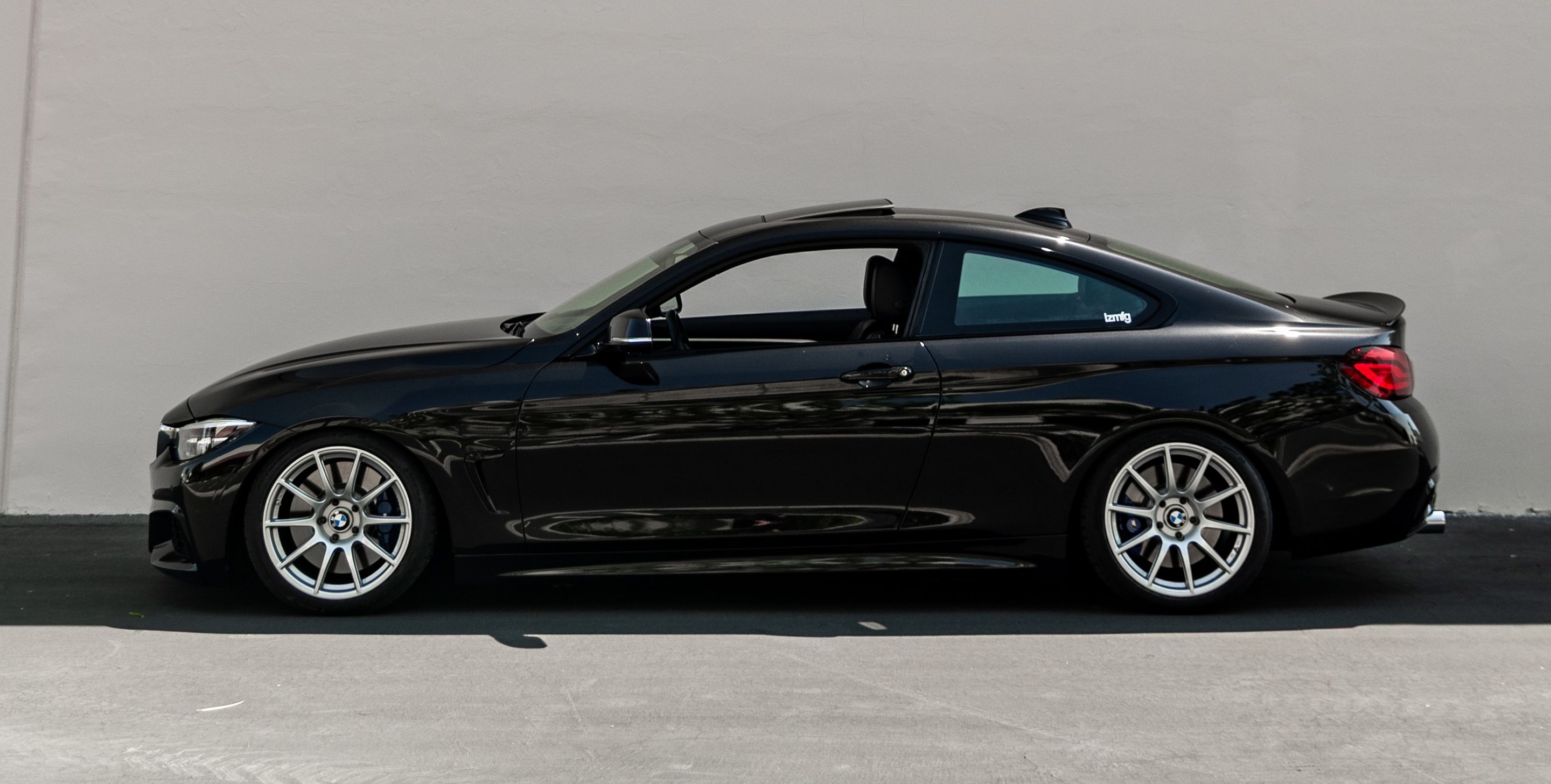 Black BMW F32 Coupe 4 Series with 18" SM-10 Apex wheels in Race Silver