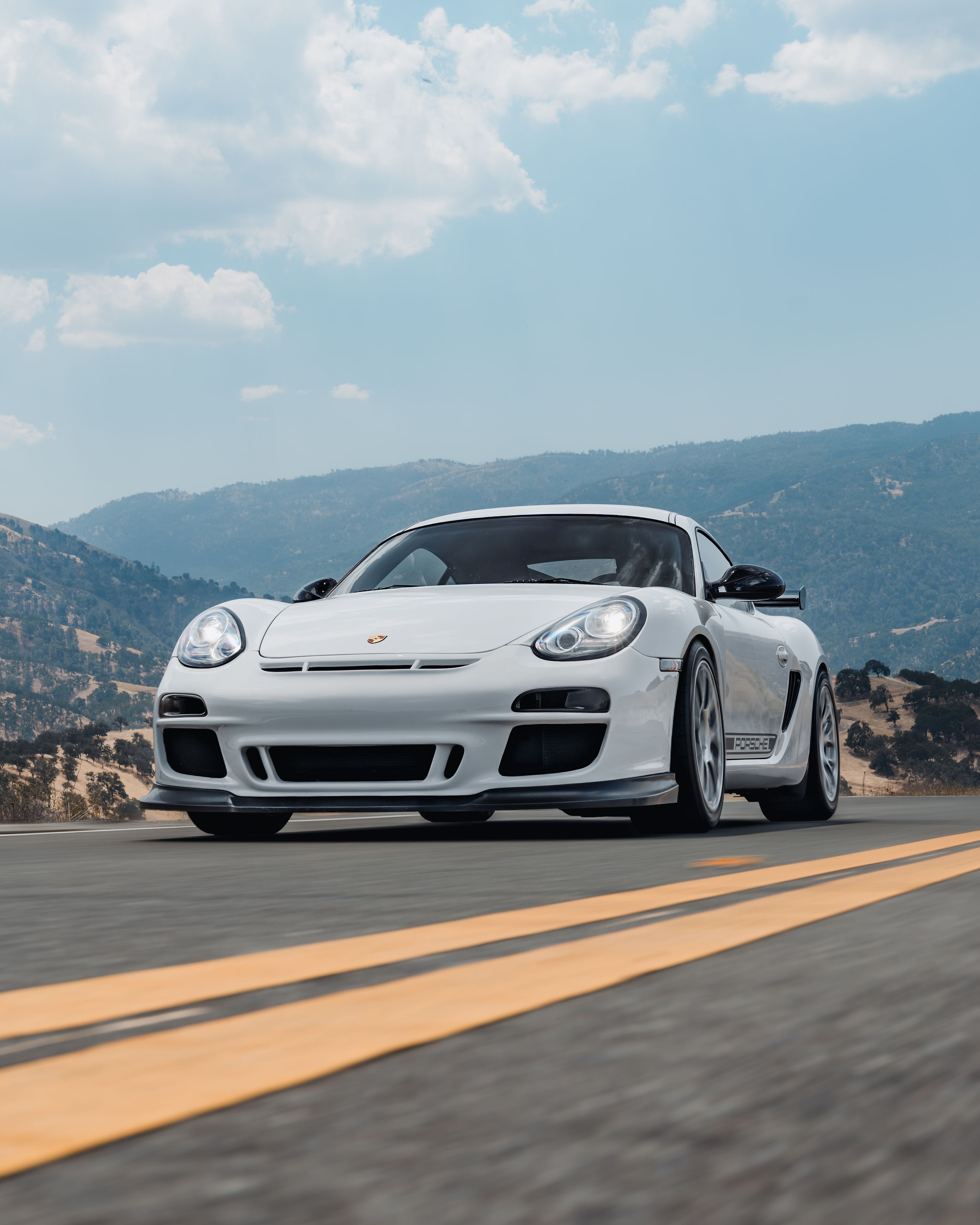 White Porsche 987 Cayman R with 18" EC-7RS Apex wheels in Race Silver
