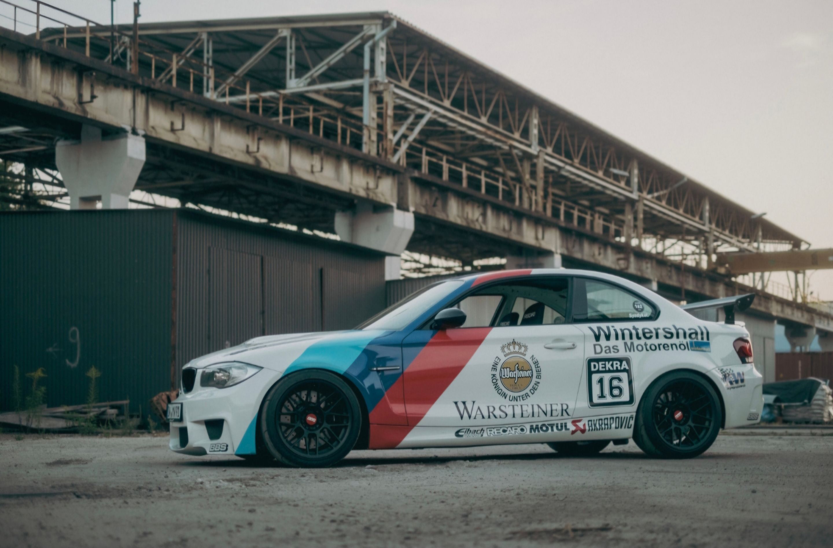 White BMW E82 1M with 18" ARC-8 Apex wheels in Satin Black