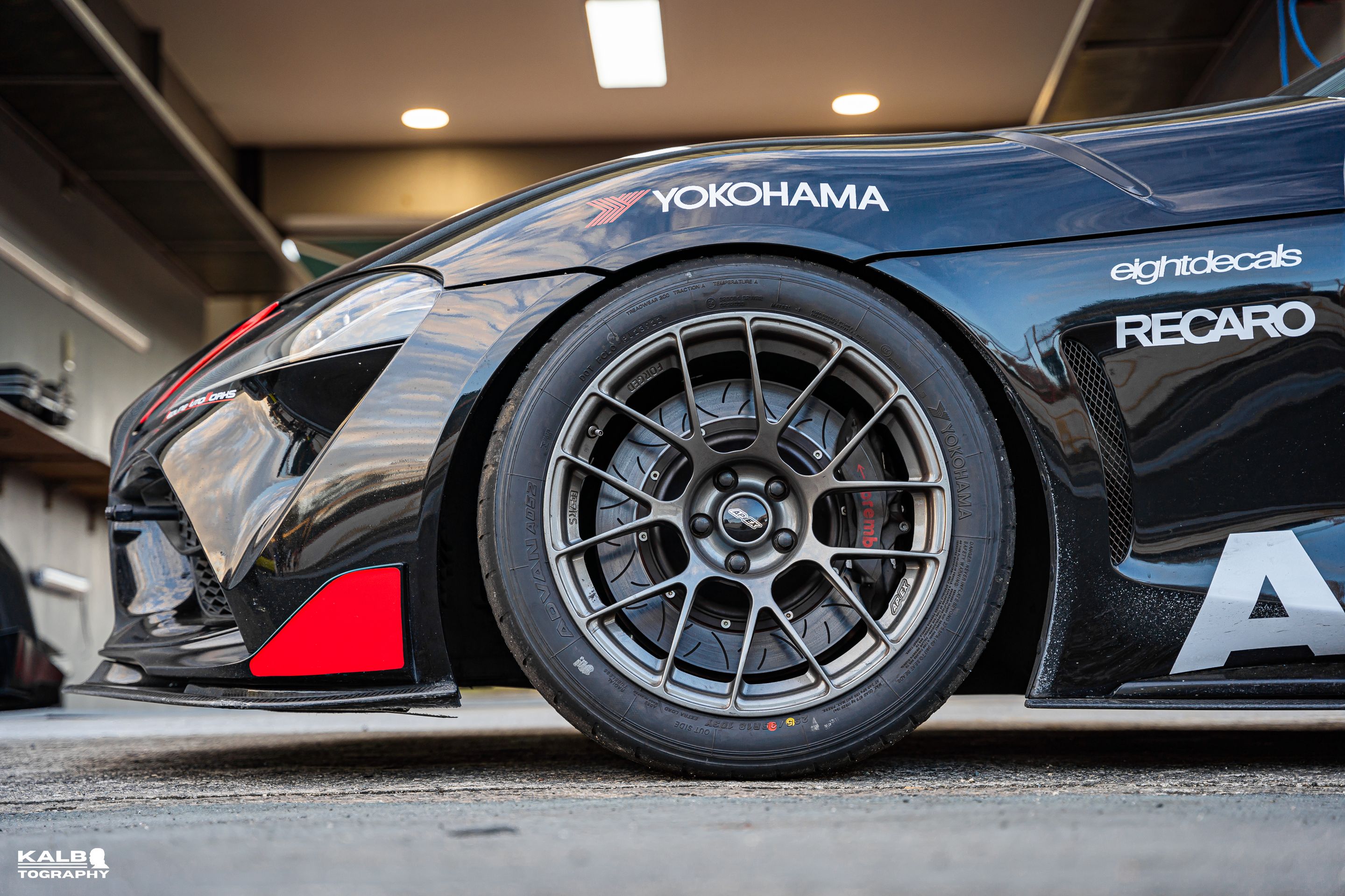 Black Toyota GR Supra with 18" EC-7RS Apex wheels in Satin Bronze