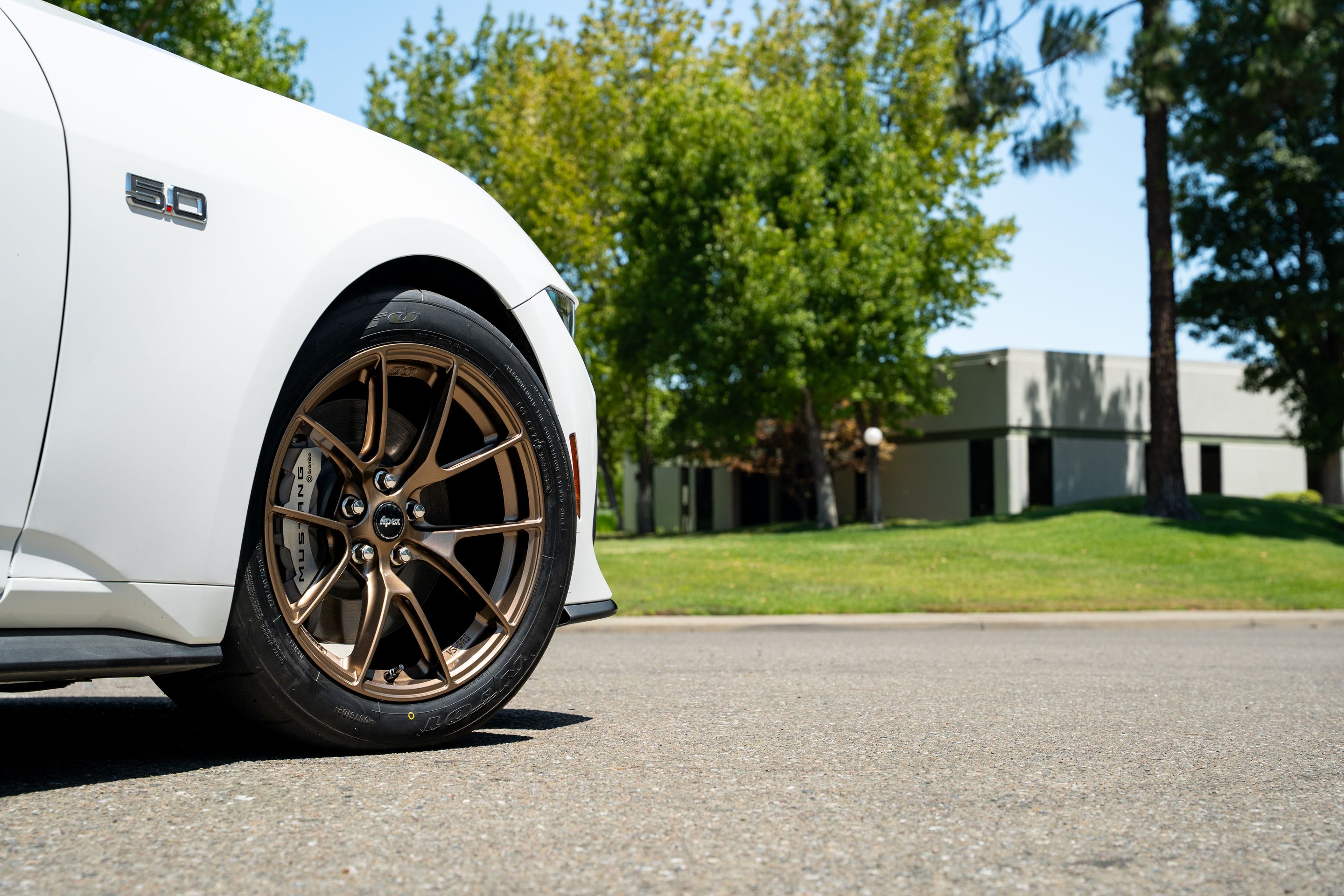 White Ford S650 Mustang GT with 18" VS-5RS Apex wheels in Satin Bronze