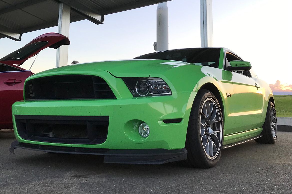 Green Ford S197 Mustang GT with 18" EC-7 Apex wheels in Race Silver