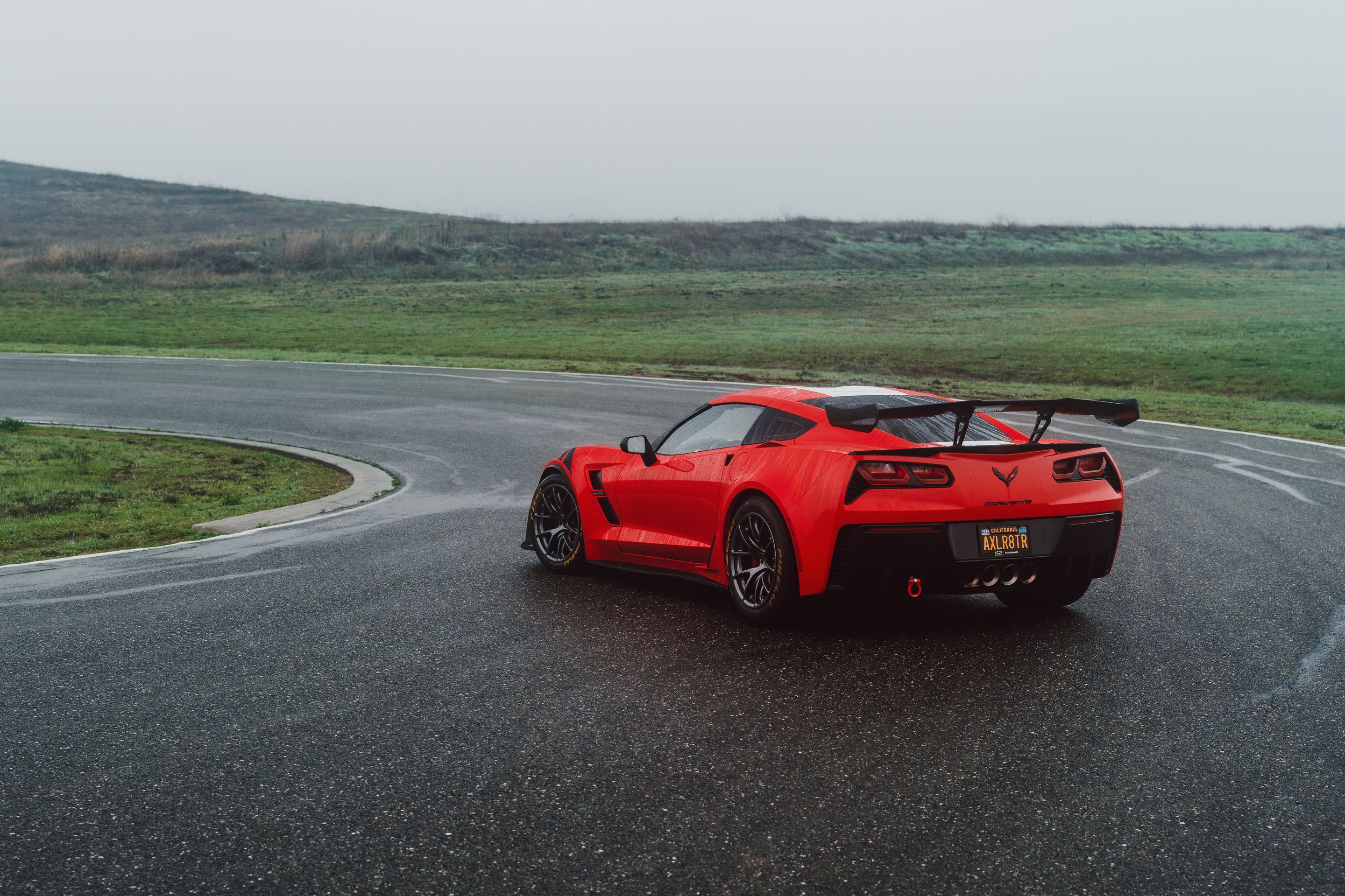 Red Chevrolet C7 Corvette Grand Sport with 18" VS-5RE Apex wheels in Anthracite