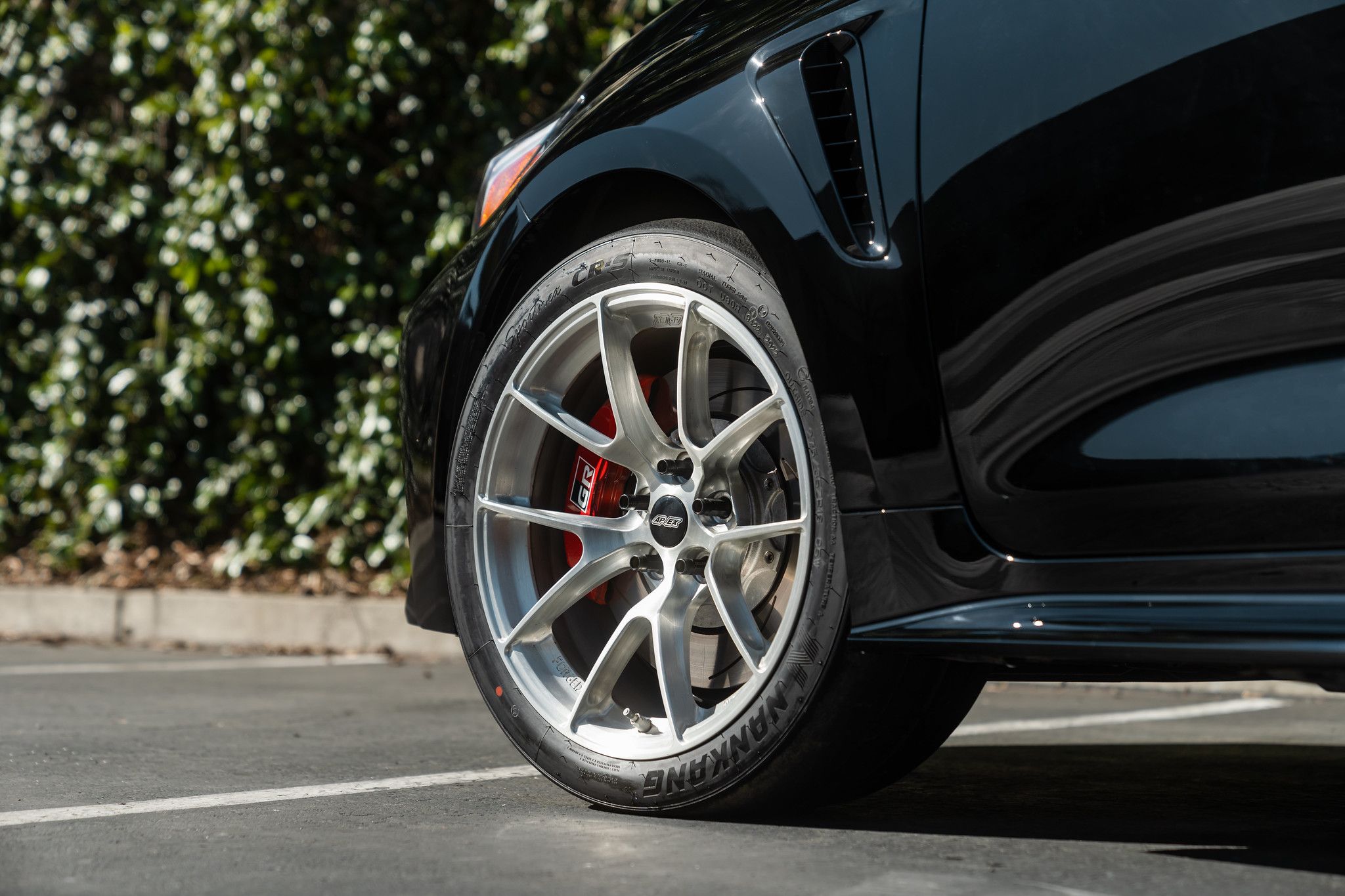 Black Toyota GR Corolla with 18" VS-5RS Apex wheels in Brushed Clear