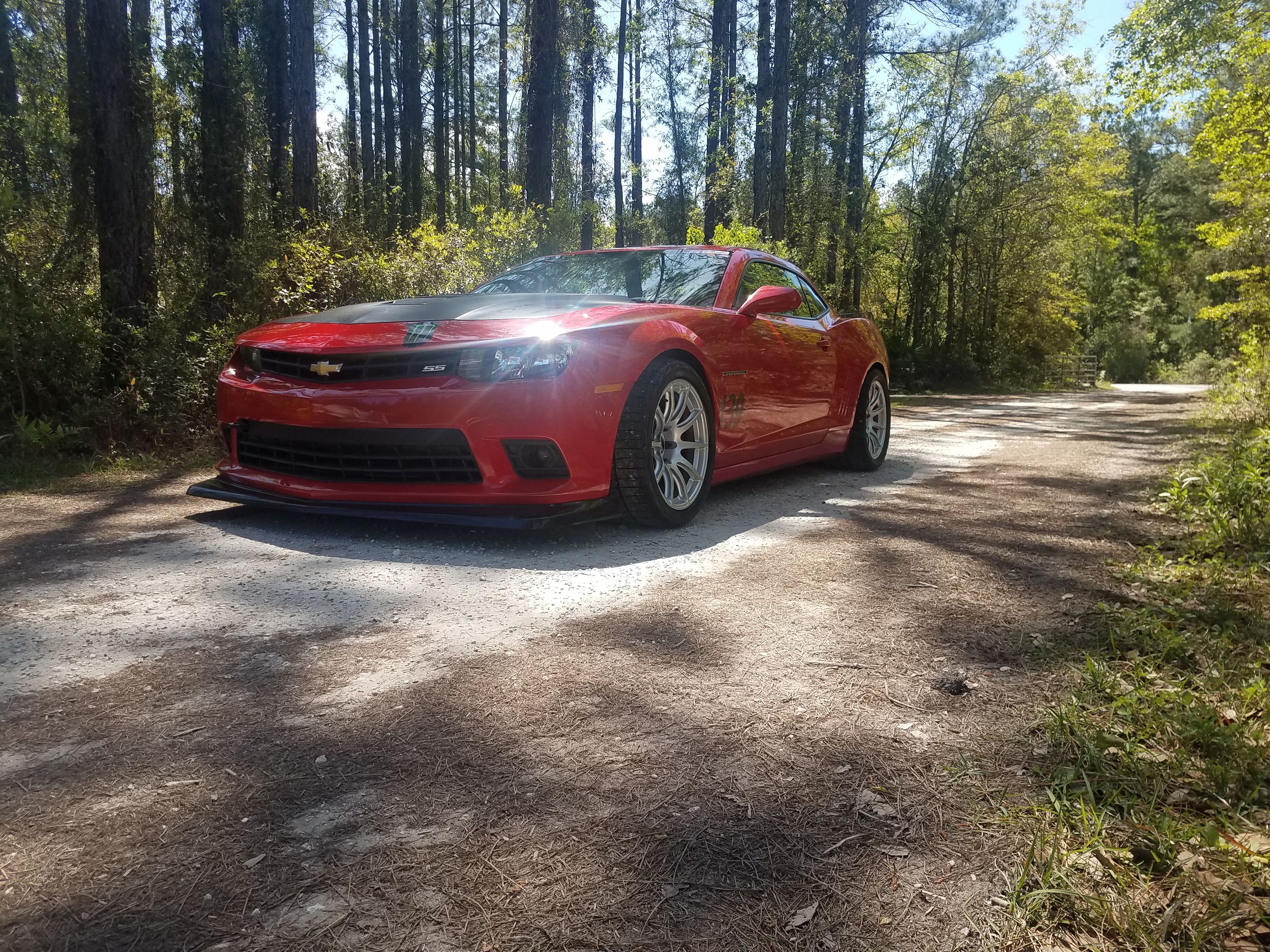 Red Chevrolet 5th Gen Camaro SS 1LE with 18" SM-10 Apex wheels in Race Silver