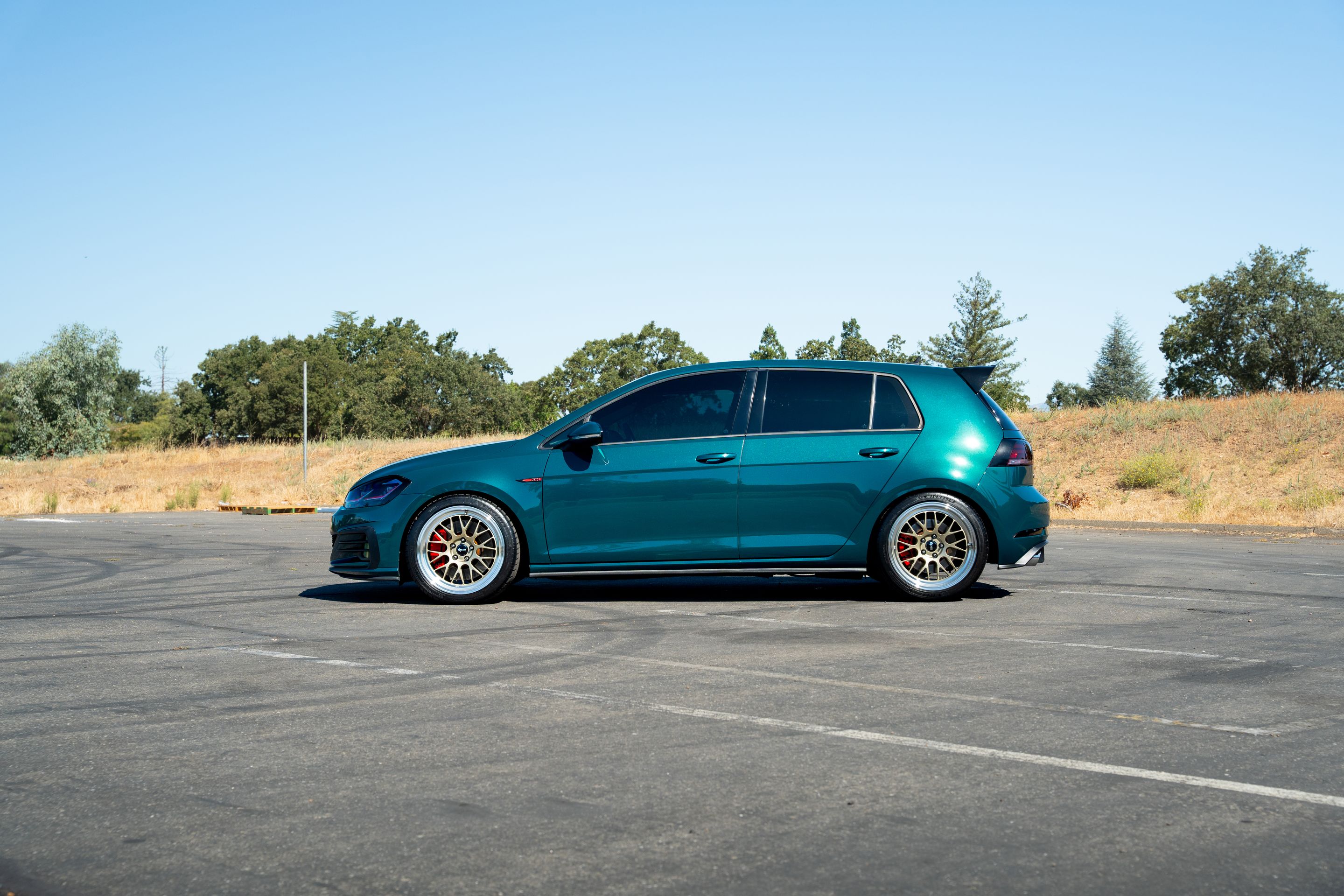 Green VW MK7 GTI with 18" ML-10RT Apex wheels in Machined Lip Gloss Motorsport Gold