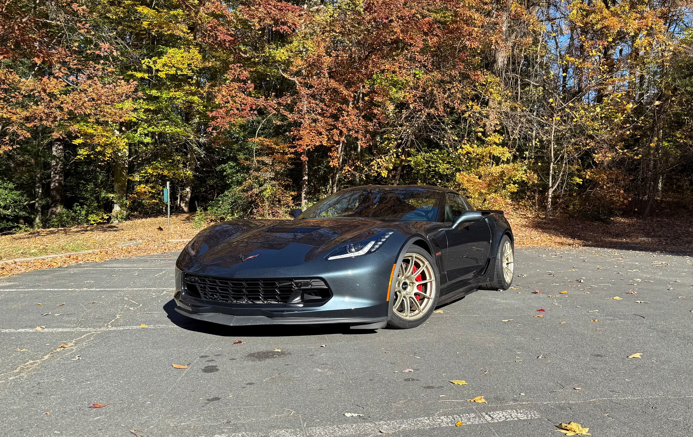 Grey Chevrolet C7 Corvette Grand Sport with 18" SM-10RS Apex wheels in Motorsport Gold