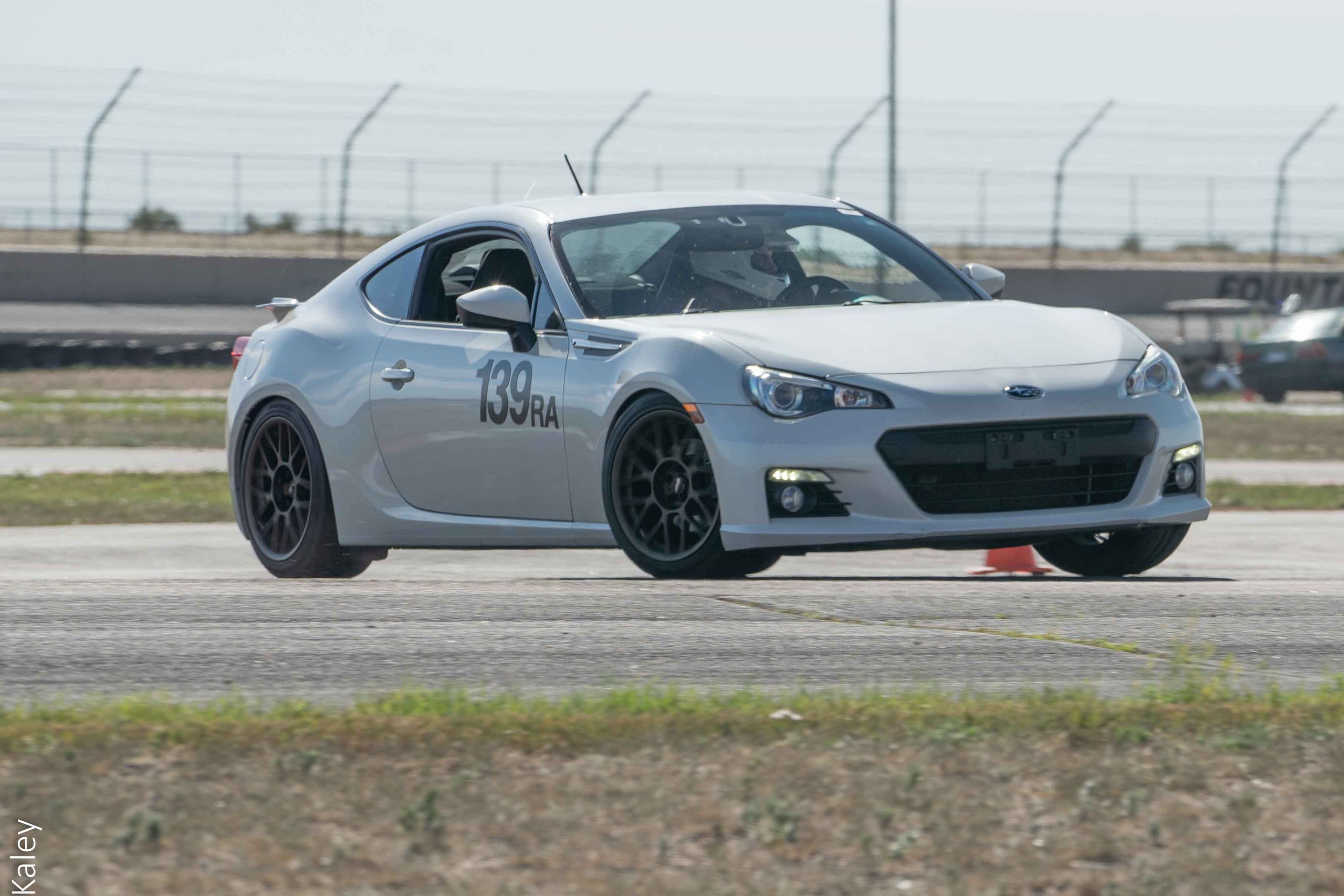 White Subaru ZC6 / Gen 1 BRZ with 17" ARC-8 Apex wheels in Satin Bronze