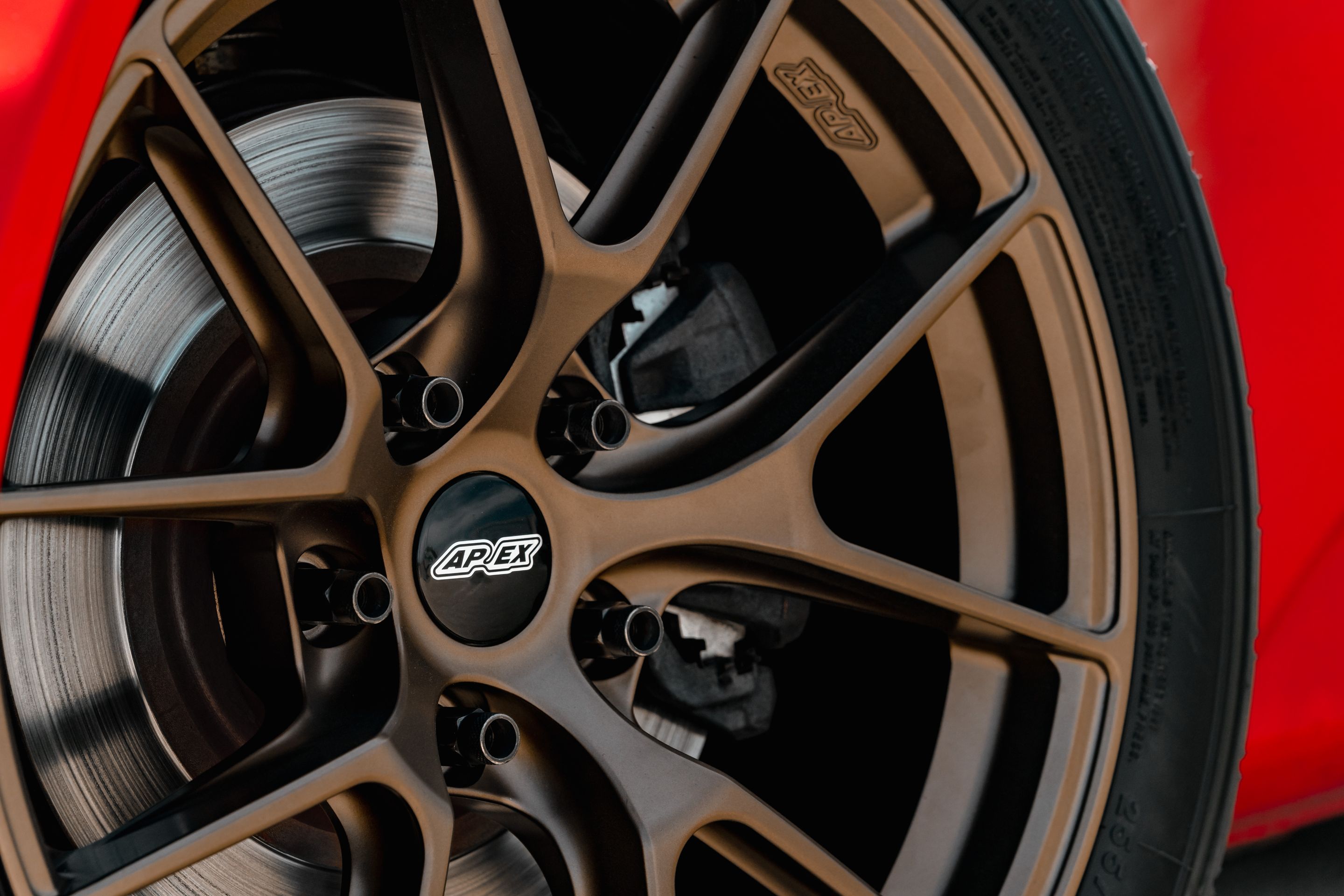 Red Honda S2000 with 17" VS-5RS Apex wheels in Satin Bronze