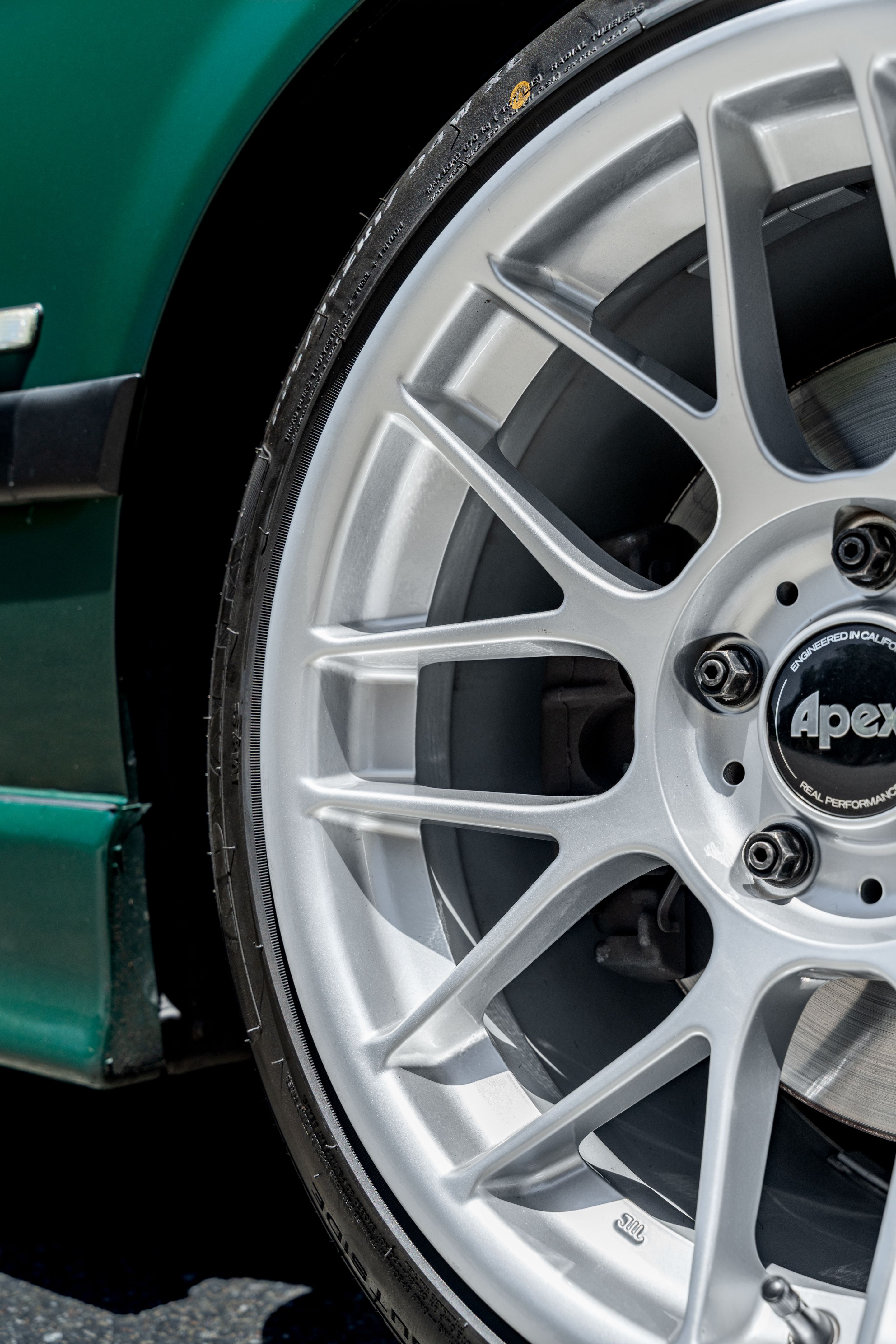 Green BMW E36 M3 with 17" ARC-8 Apex wheels in Race Silver
