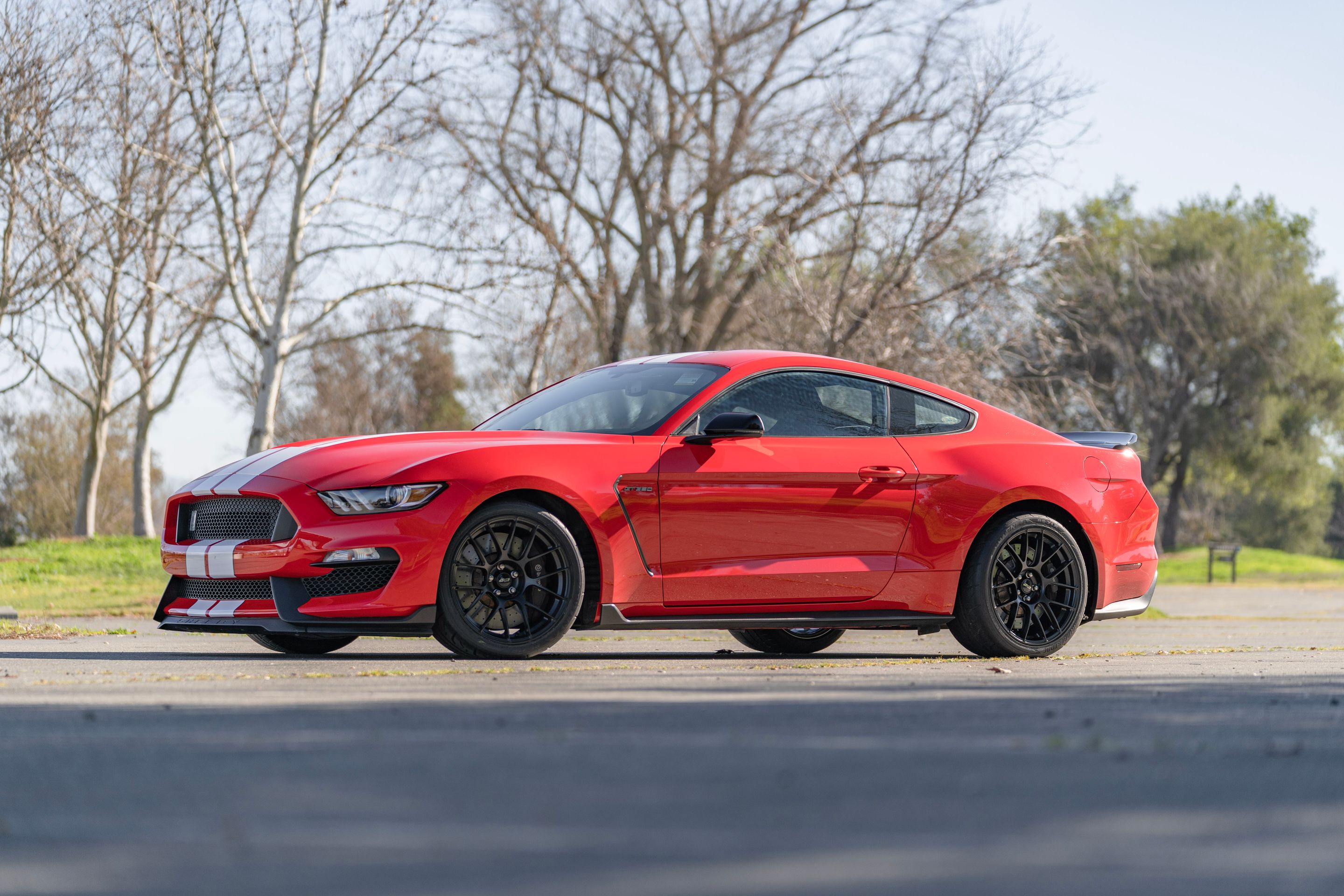 Red Ford S550 Mustang GT350 with 19" EC-7RS Apex wheels in Satin Black