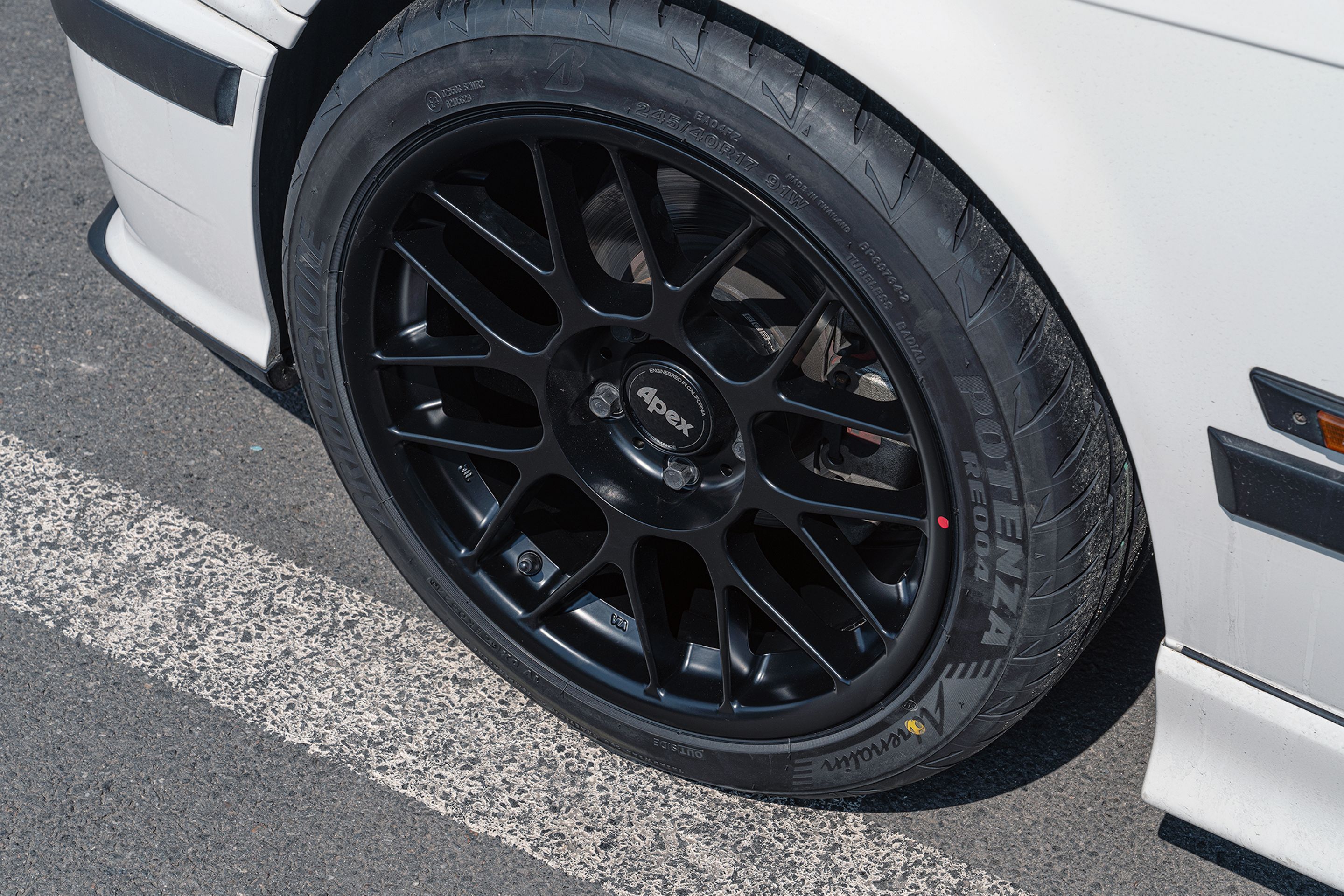 White BMW E36 3 Series with 17" ARC-8 Apex wheels in Satin Black