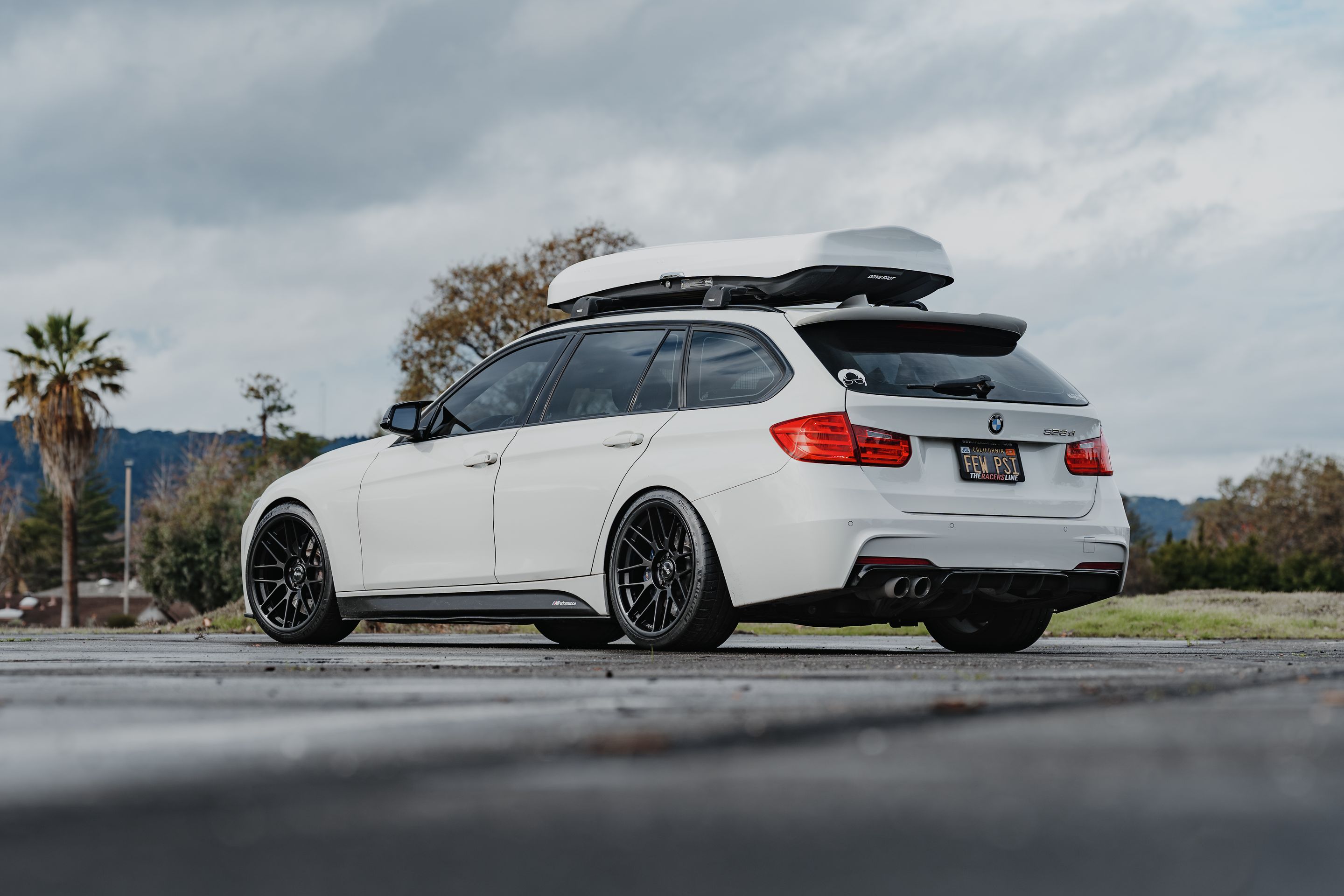 White BMW F31 Wagon 3 Series with 19" ARC-8RT Apex wheels in Satin Black