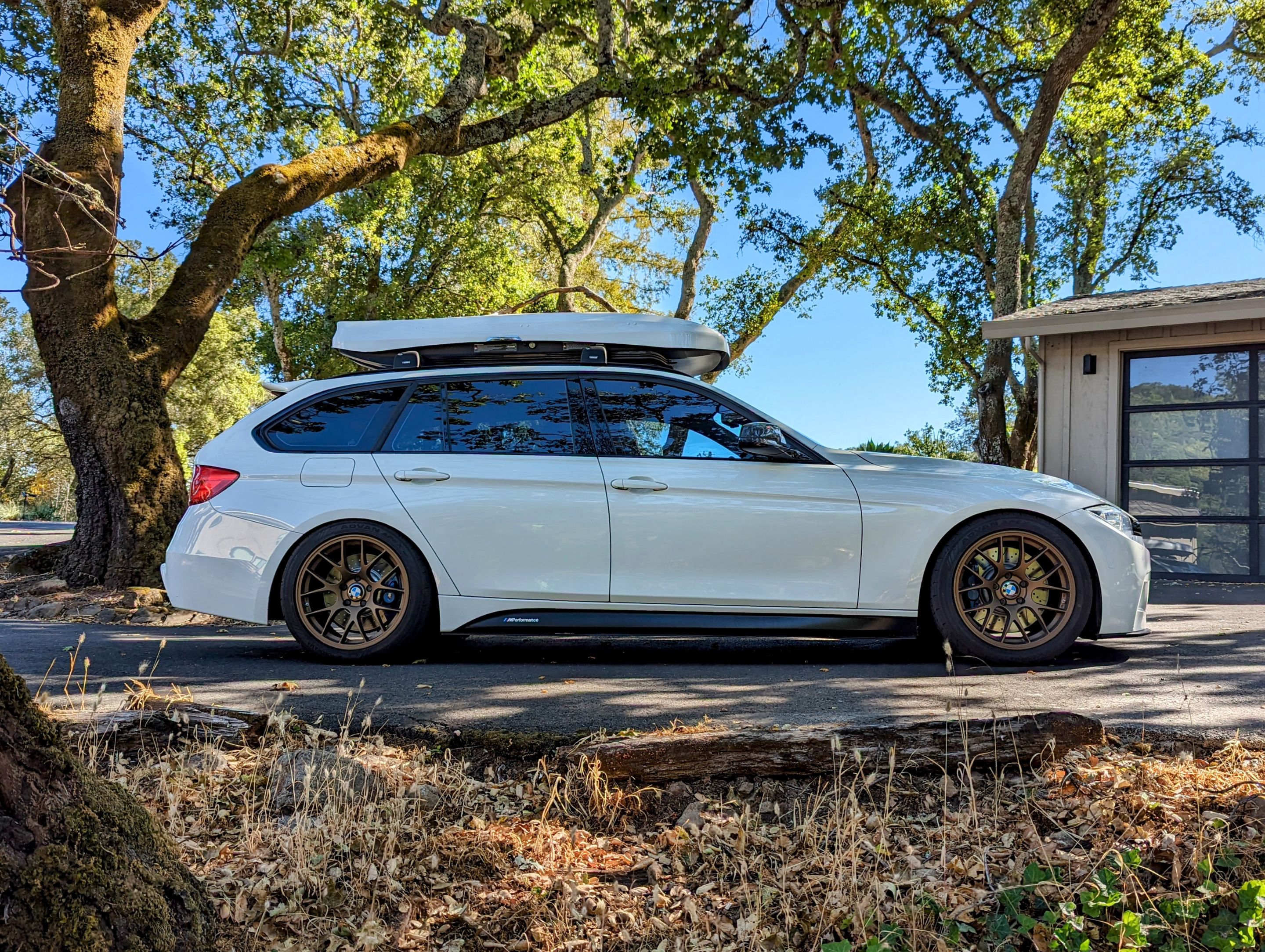 White BMW F31 Wagon 3 Series with 18" EC-7 Apex wheels in Satin Bronze