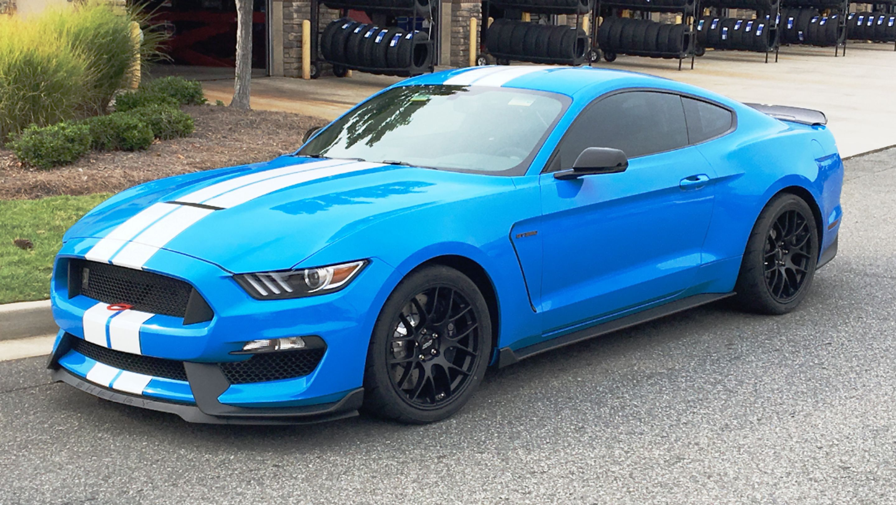 Blue Ford S550 Mustang GT350 with 19" EC-7 Apex wheels in Satin Black