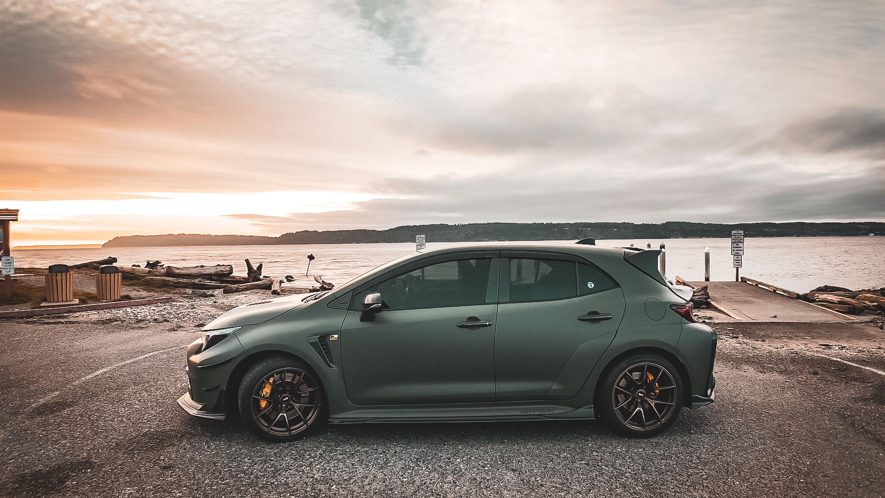 Green Toyota GR Corolla with 18" VS-5RS Apex wheels in Satin Bronze