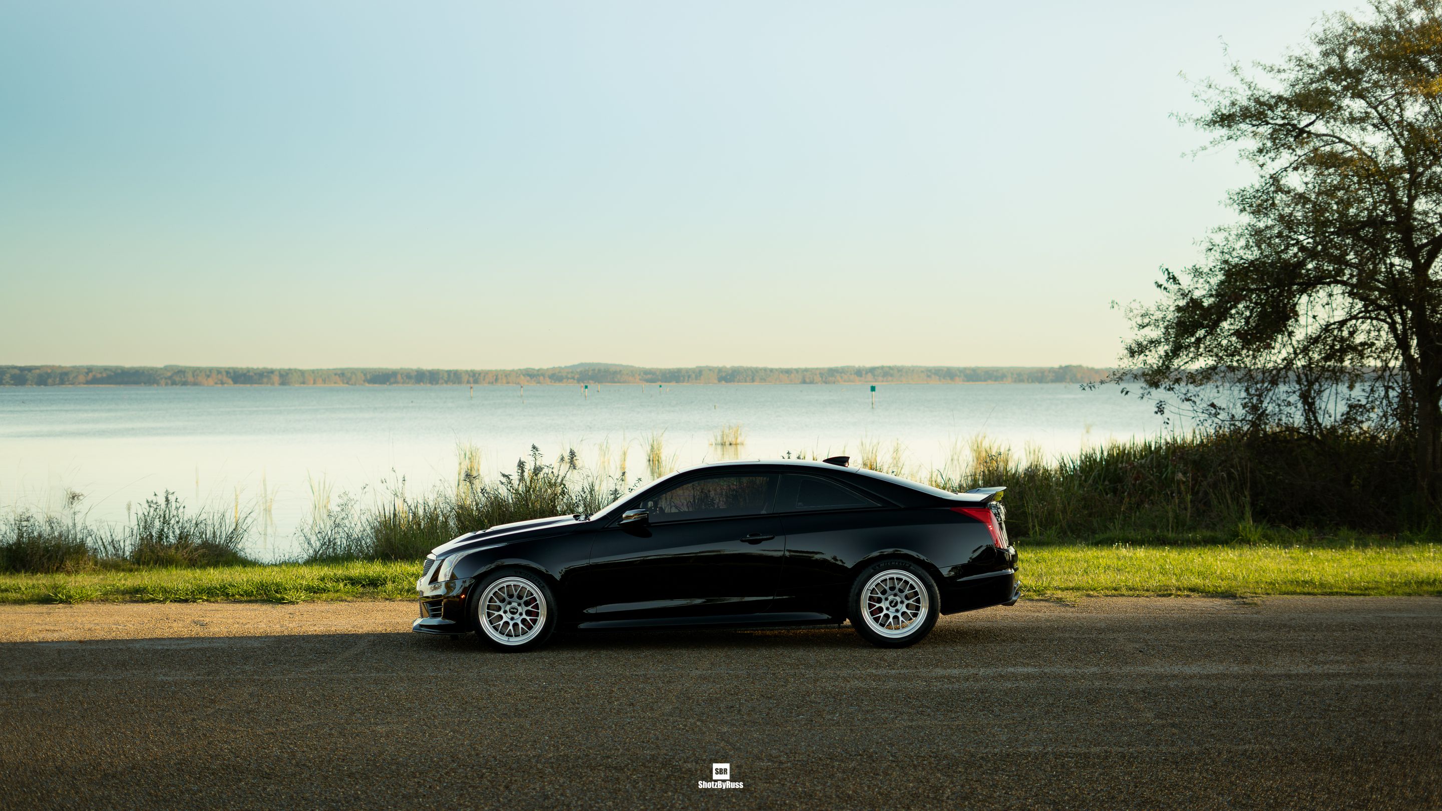 Black Cadillac ATS-V with 18" ML-10RT Apex wheels in Machined Lip Race Silver