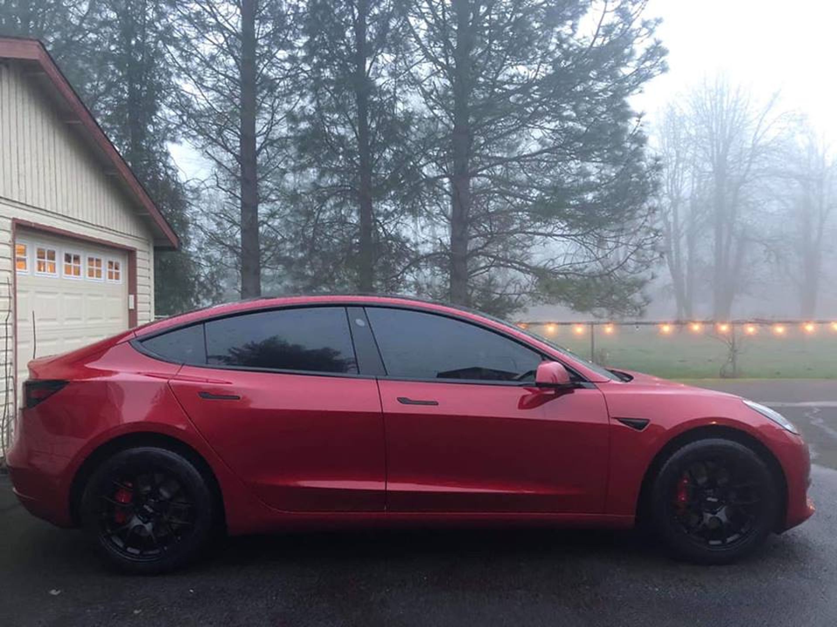 Red Tesla Model 3 with 18" EC-7 Apex wheels in Satin Black