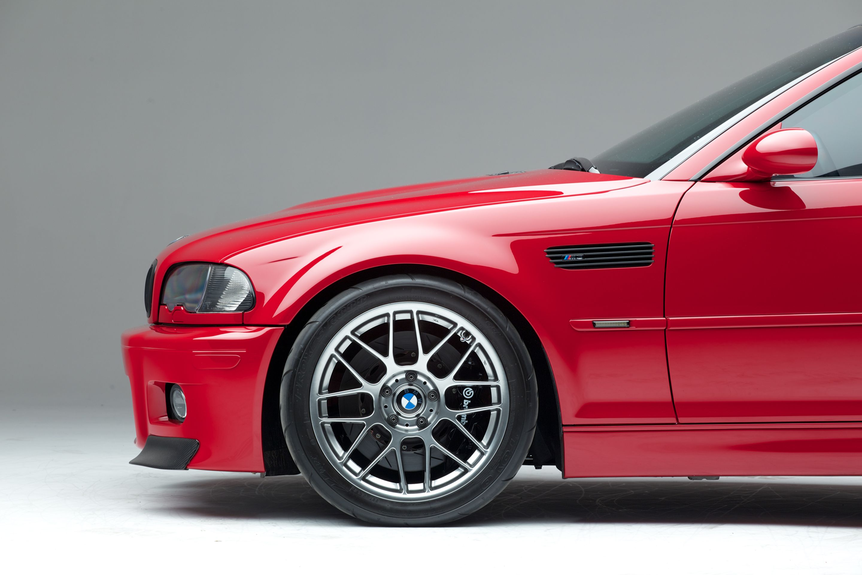 Red BMW E46 M3 with 18" ARC-8 Apex wheels in Hyper Black