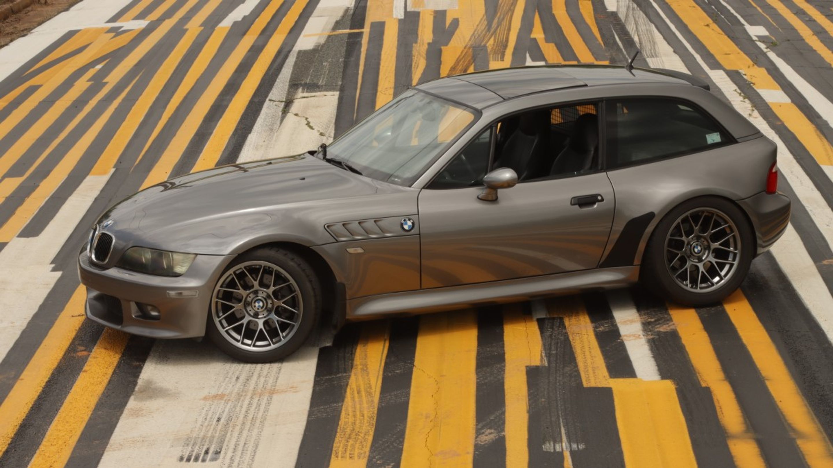 Silver BMW E36/8 Coupe Z3 with 17" ARC-8 Apex wheels in Hyper Black