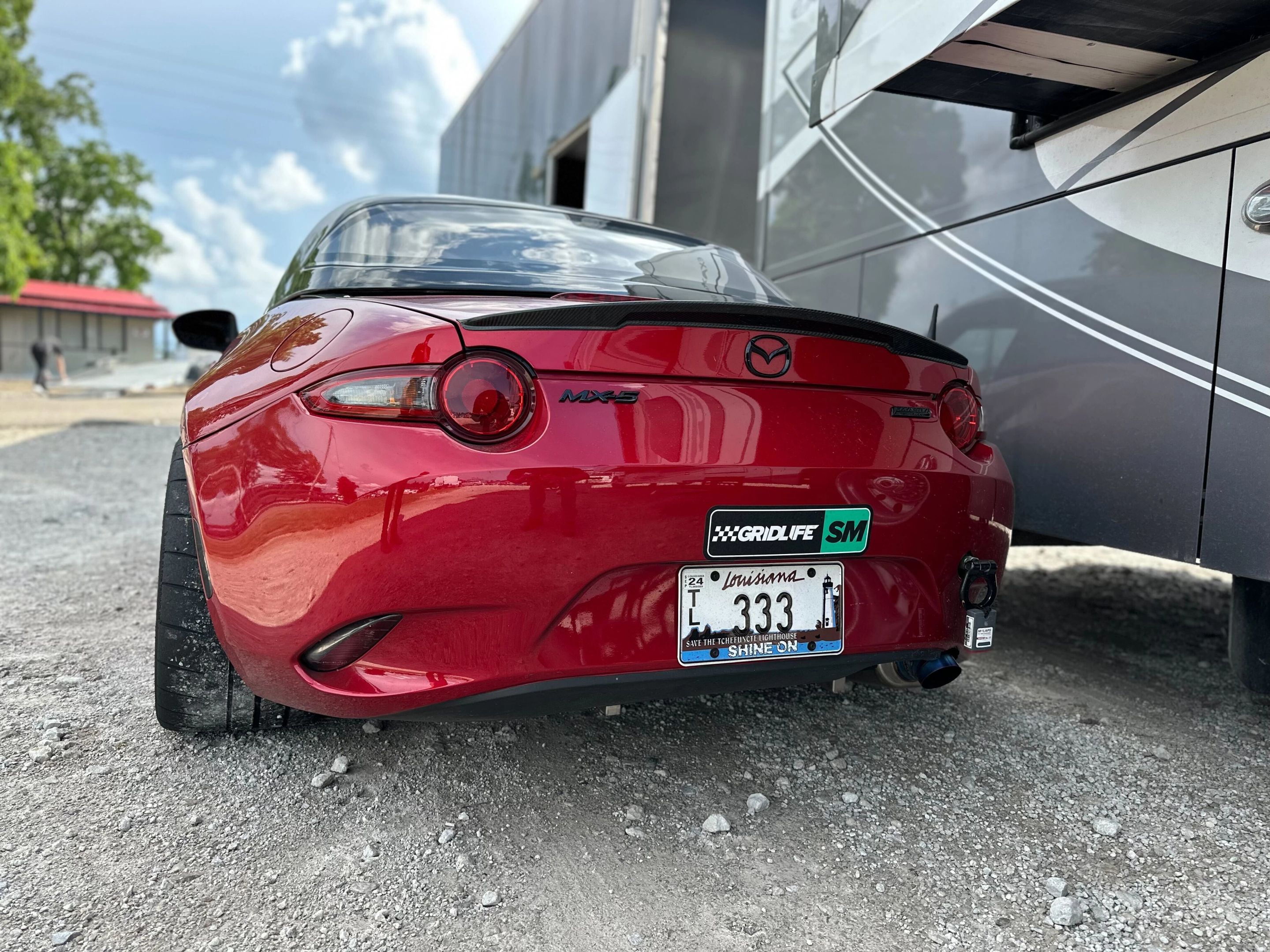Red Mazda ND MX-5 Miata with 17" SM-8RS Apex wheels in Satin Bronze