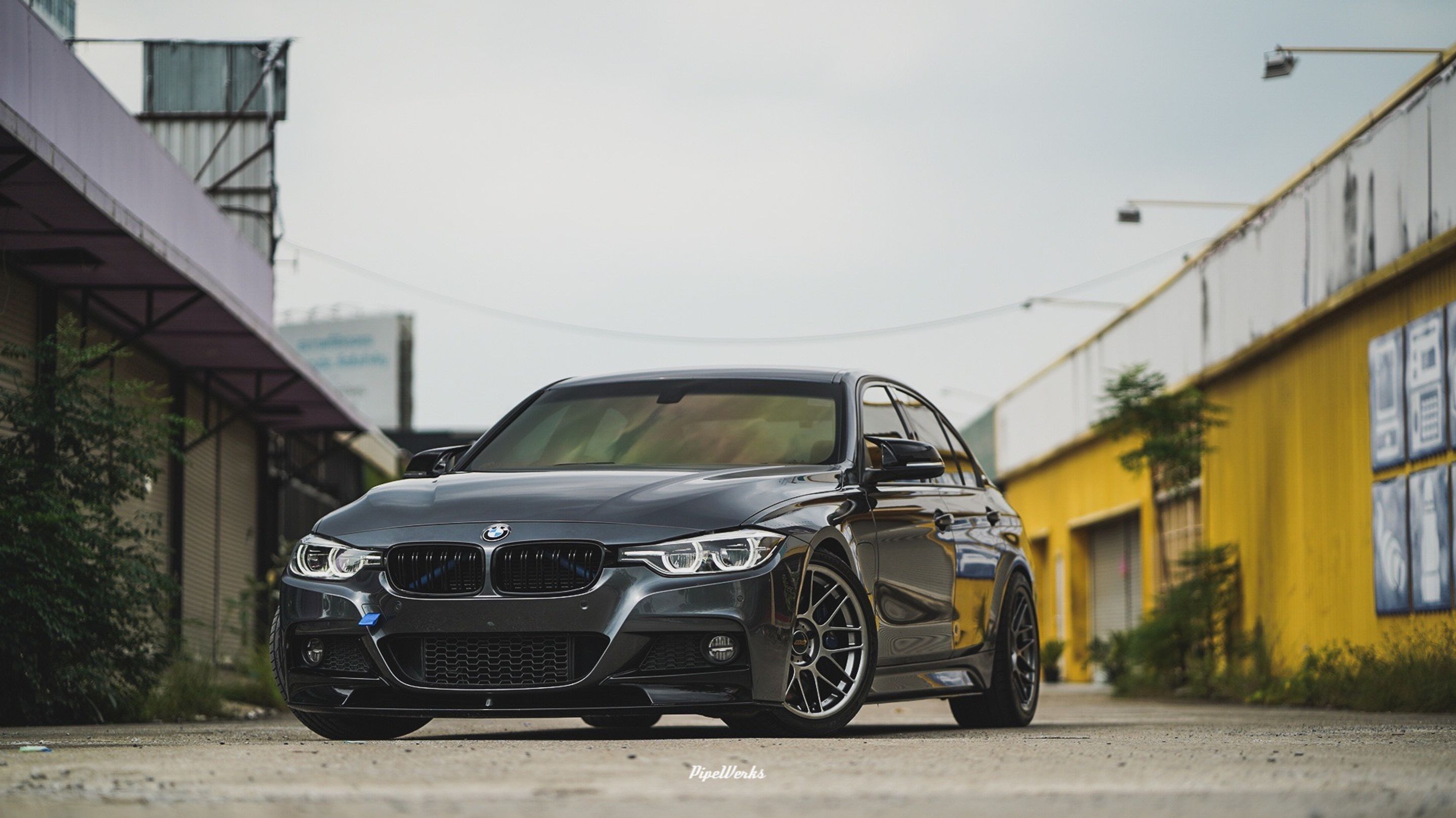 Grey BMW F30 Sedan 3 Series with 18" ARC-8 Apex wheels in Hyper Black