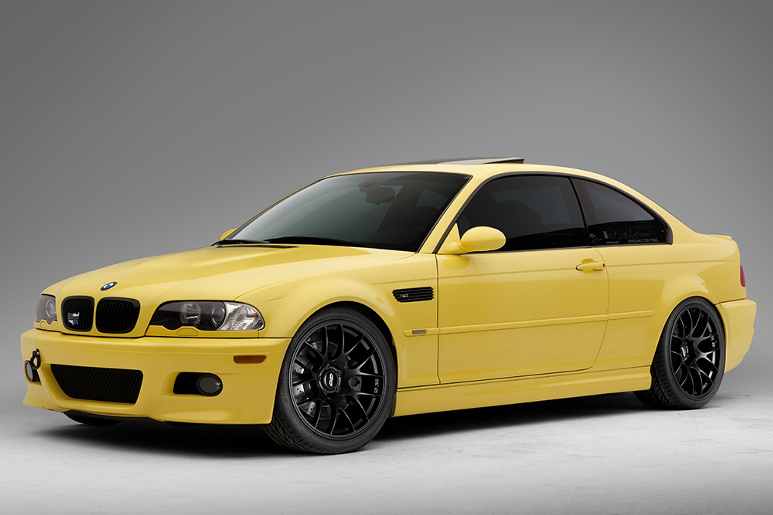 Yellow BMW E46 M3 with 19" EC-7 Apex wheels in Satin Black