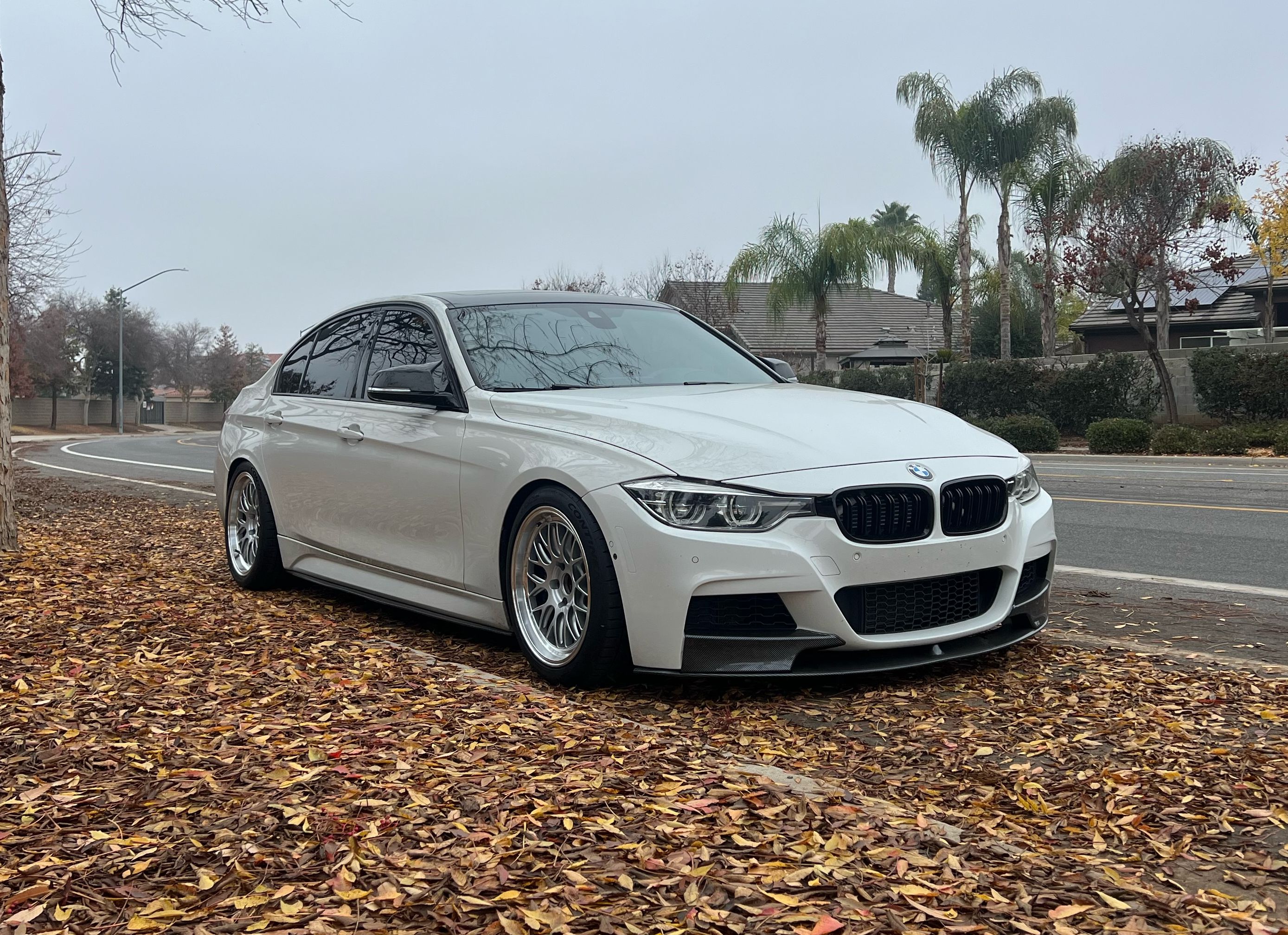 White BMW F30 Sedan 3 Series with 18" ML-10RT Apex wheels in Machined Lip Race Silver