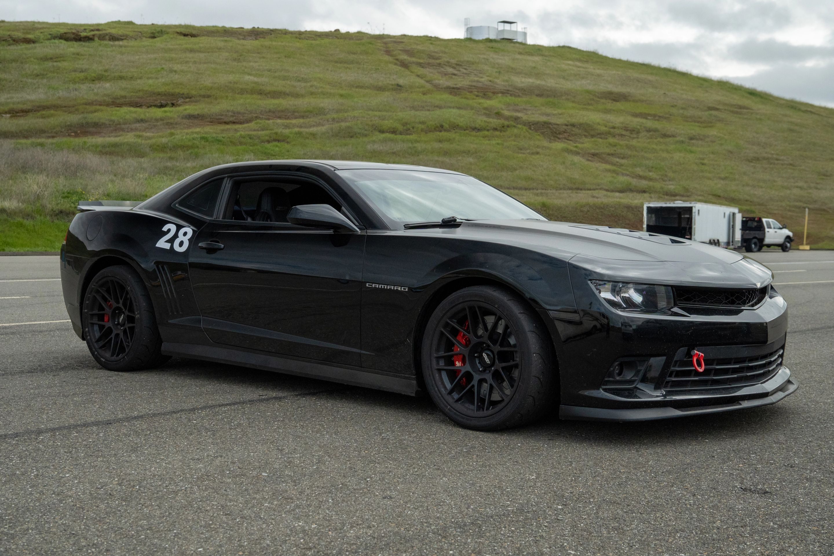 Black Chevrolet 5th Gen Camaro SS with 19" ARC-8 Apex wheels in Satin Black