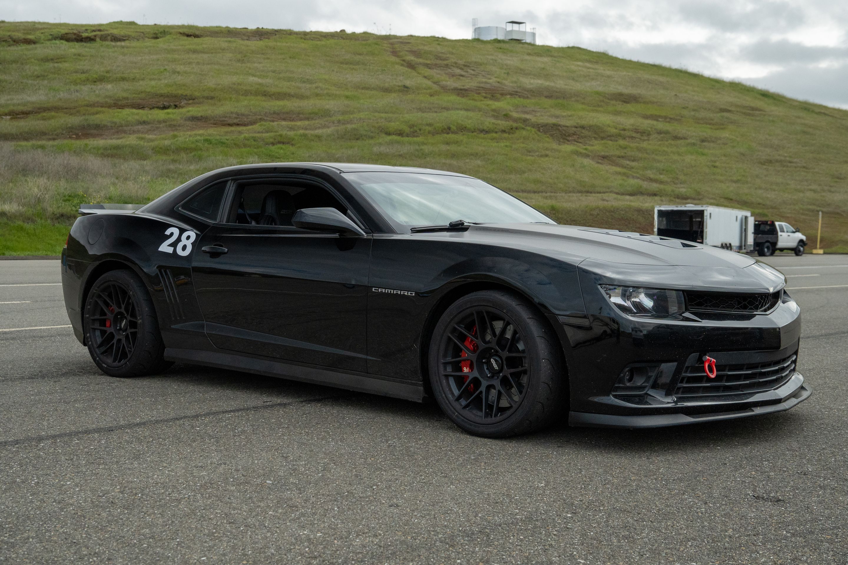 Black Chevrolet 5th Gen Camaro SS with 19" ARC-8 Apex wheels in Satin Black