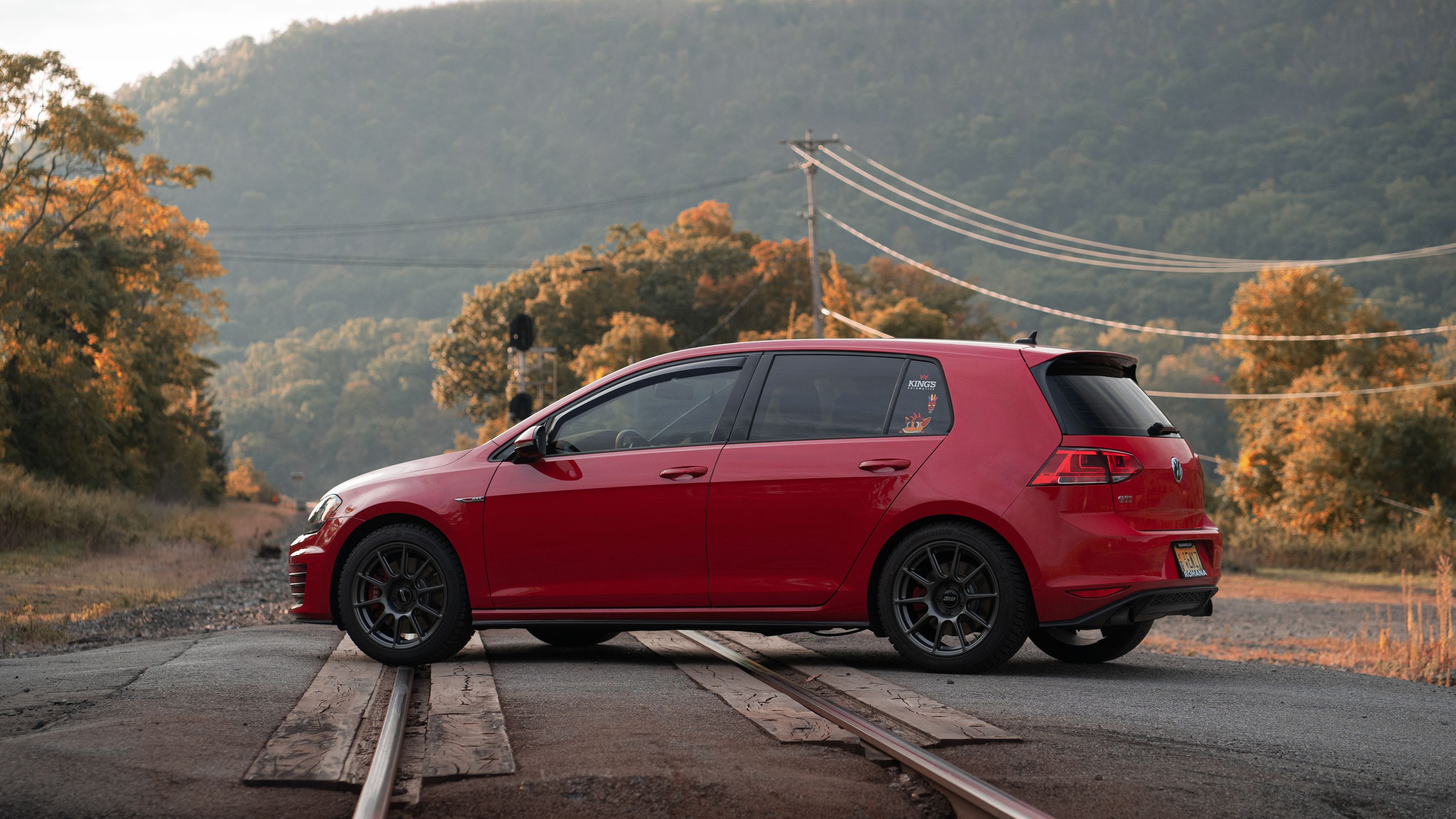 Red VW MK7 GTI with 17" SM-10 Apex wheels in Anthracite
