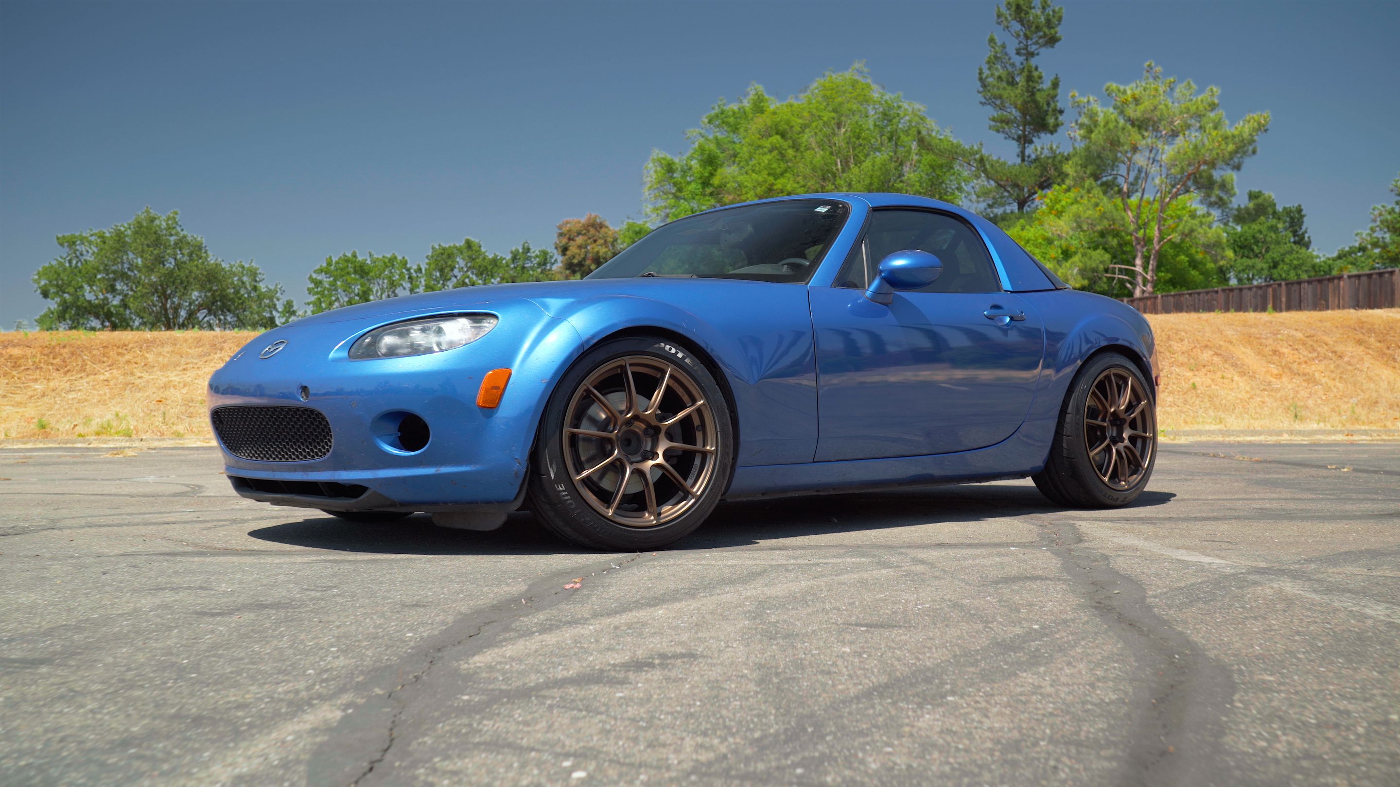 Blue Mazda NC MX-5 Miata with 17" SM-10RS Apex wheels in Satin Bronze