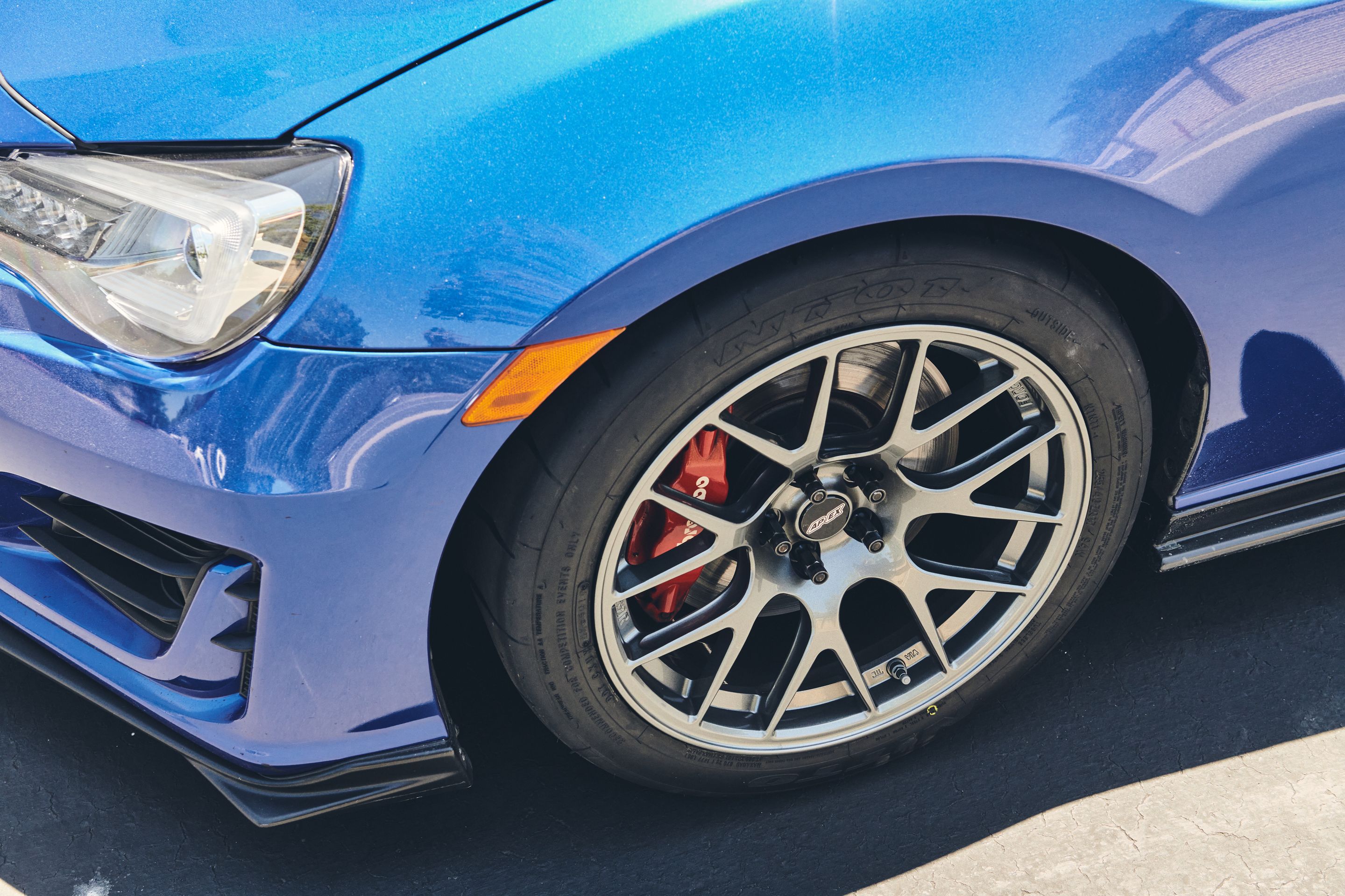 Blue Subaru ZC6 / Gen 1 BRZ with 17" EC-7R Apex wheels in Anthracite