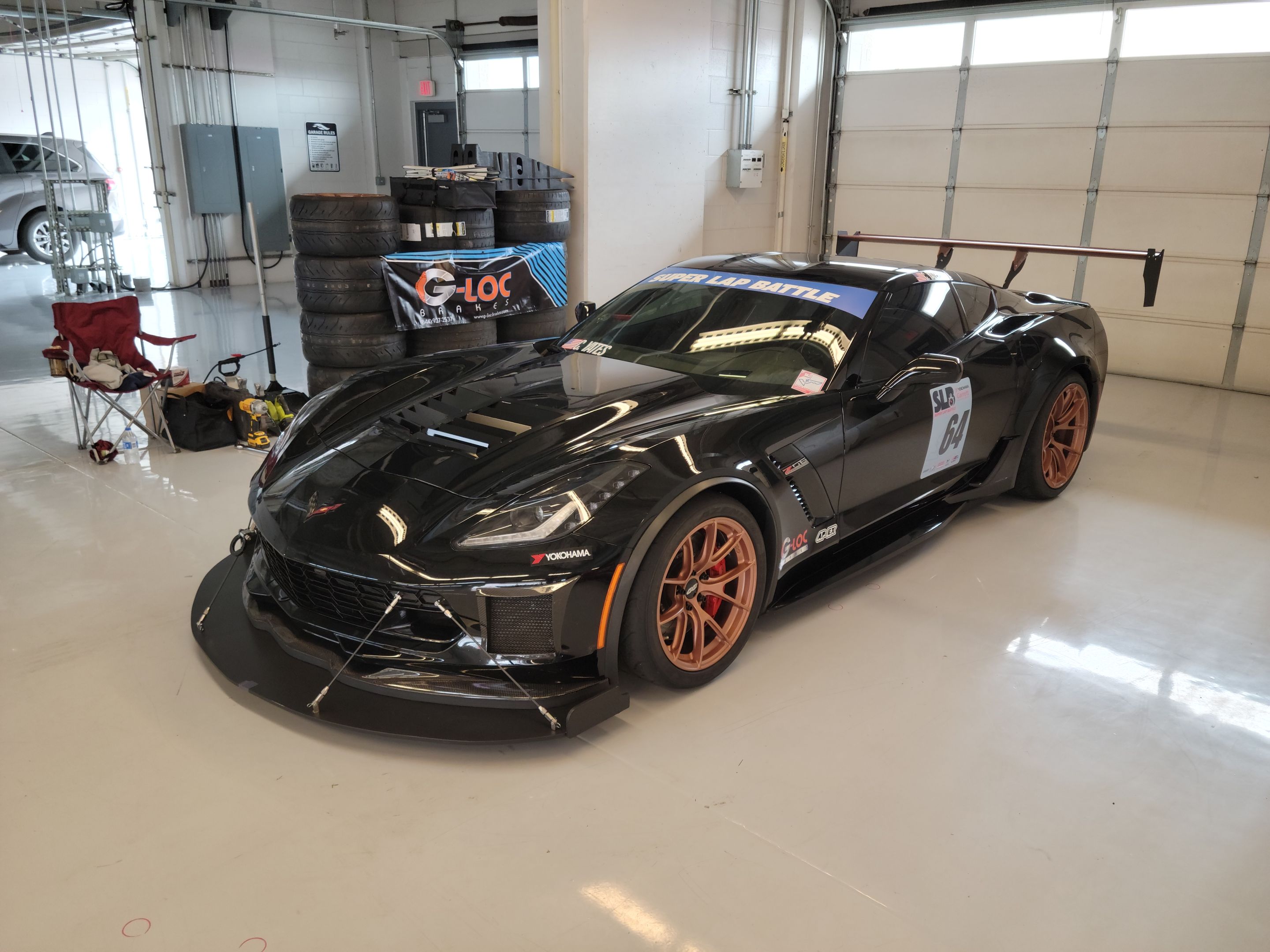 Black Chevrolet C7 Corvette Z06 with 18"/19" VS-5RS Apex wheels in Custom Finish