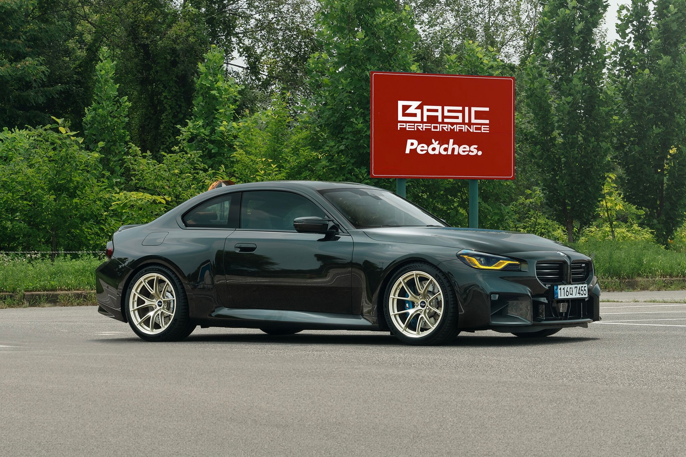 Black BMW G87 M2 with 19" VS-5RS Apex wheels in Motorsport Gold