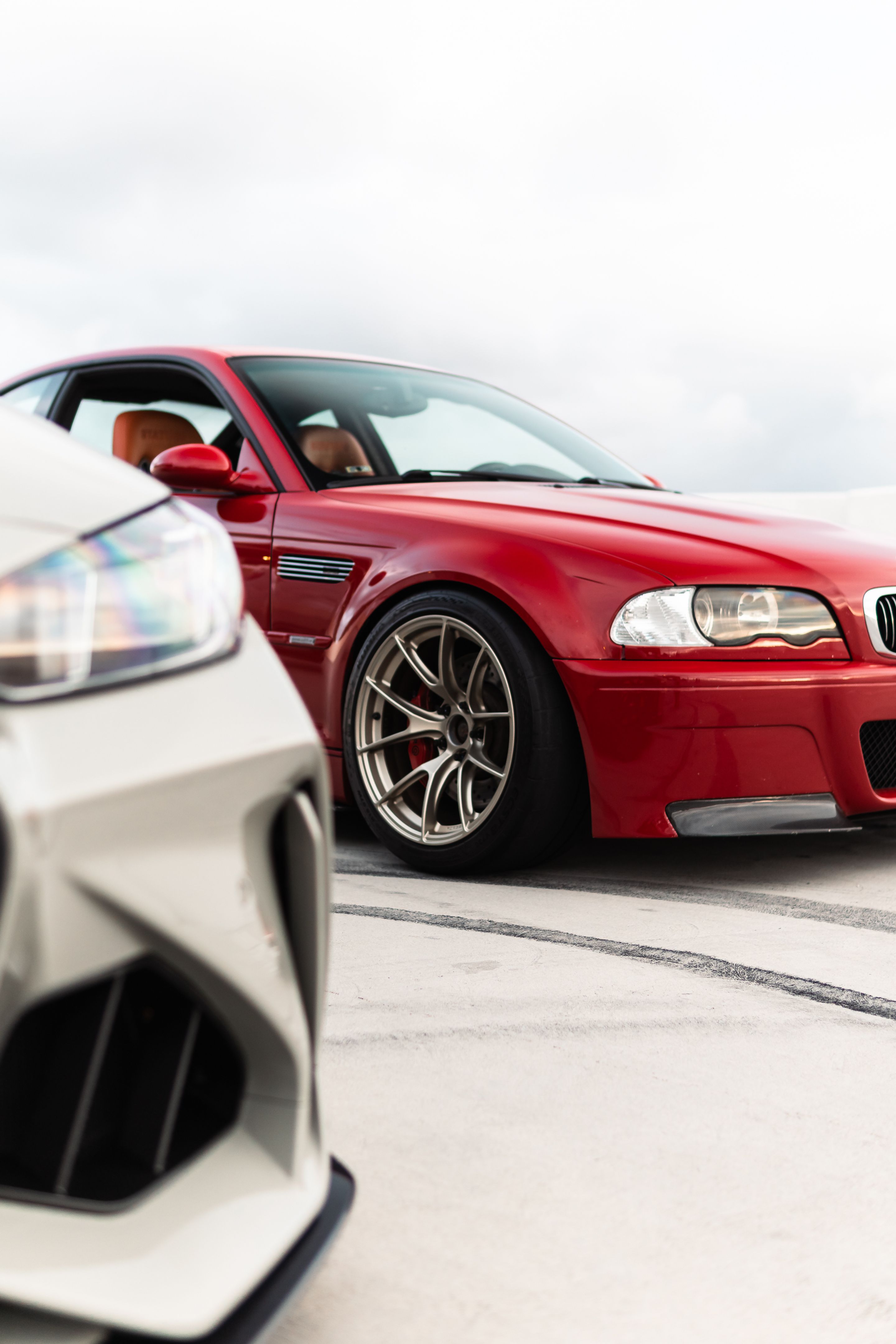 Red BMW E46 M3 with 18" VS-5RS Apex wheels in Motorsport Gold