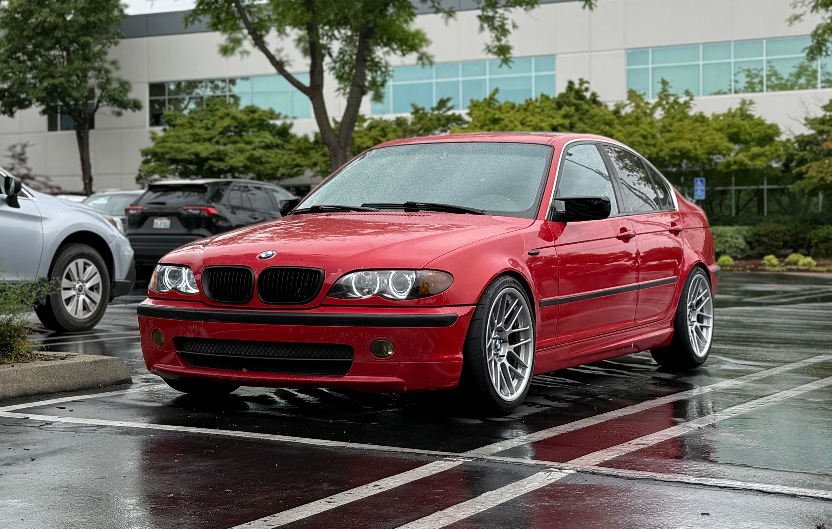 Red BMW E46 3 Series with 18" ARC-8RT Apex wheels in Race Silver